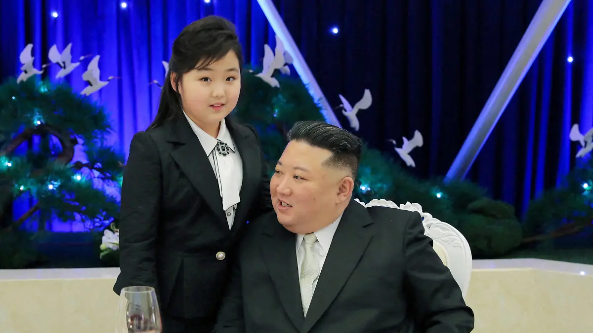 North Korean leader Kim Jong Un talks with his daughter Kim Ju Ae at a banquet to celebrate the 75th anniversary of the Korean People's Army the following day, in Pyongyang, North Korea February 7, 2023 in this photo released February 8, 2023 by North Korea's Korean Central News Agency (KCNA). KCNA via REUTERS ATTENTION EDITORS - THIS IMAGE WAS PROVIDED BY A THIRD PARTY. REUTERS IS UNABLE TO INDEPENDENTLY VERIFY THIS IMAGE. NO THIRD PARTY SALES. SOUTH KOREA OUT. NO COMMERCIAL OR EDITORIAL SALES IN SOUTH KOREA.