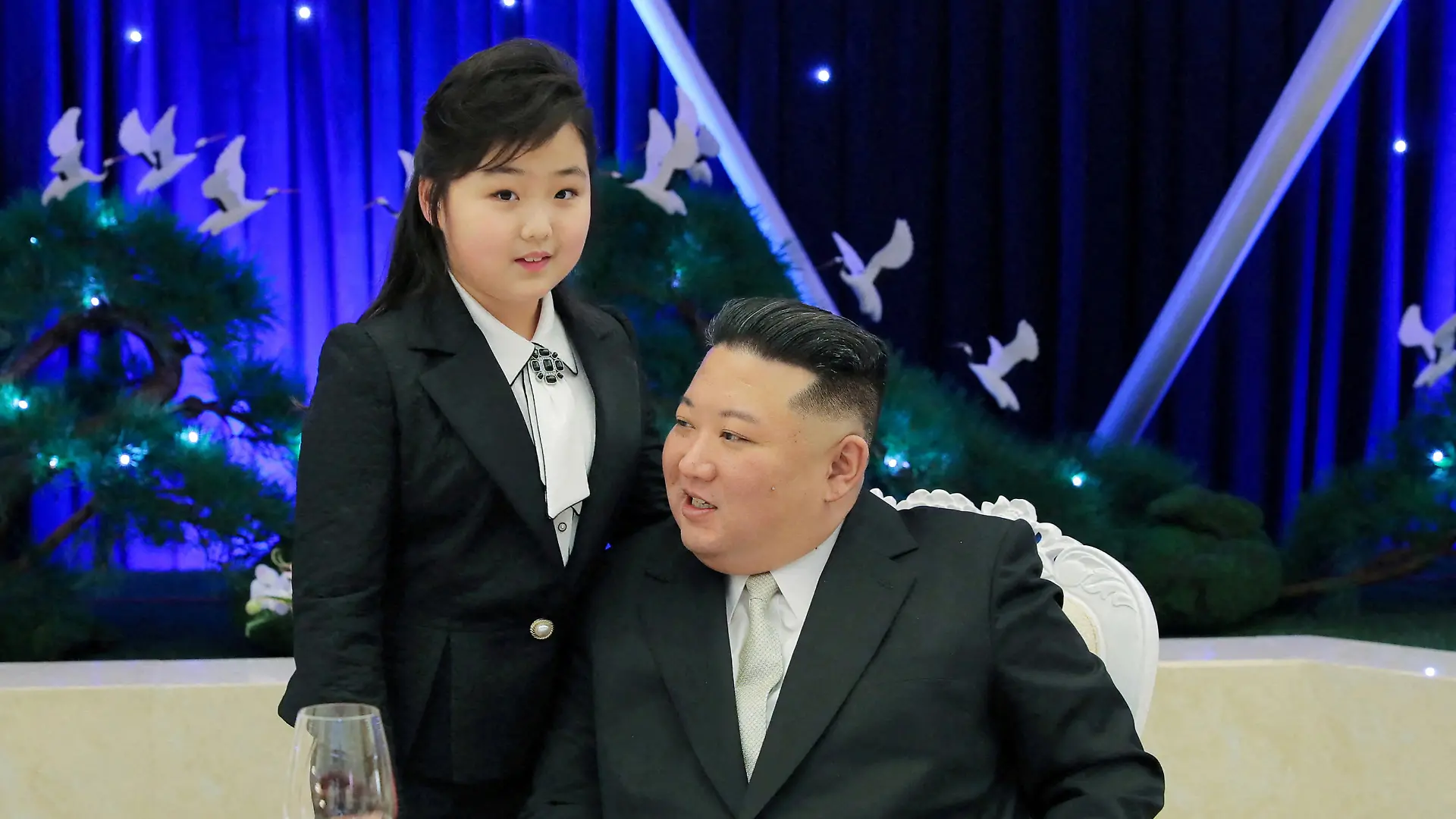 North Korean leader Kim Jong Un talks with his daughter Kim Ju Ae at a banquet to celebrate the 75th anniversary of the Korean People's Army the following day, in Pyongyang, North Korea February 7, 2023 in this photo released February 8, 2023 by North Korea's Korean Central News Agency (KCNA). KCNA via REUTERS ATTENTION EDITORS - THIS IMAGE WAS PROVIDED BY A THIRD PARTY. REUTERS IS UNABLE TO INDEPENDENTLY VERIFY THIS IMAGE. NO THIRD PARTY SALES. SOUTH KOREA OUT. NO COMMERCIAL OR EDITORIAL SALES IN SOUTH KOREA.