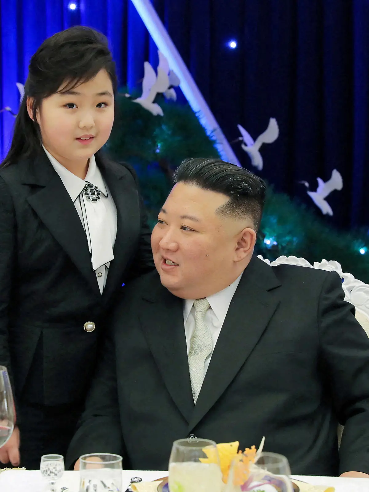 North Korean leader Kim Jong Un talks with his daughter Kim Ju Ae at a banquet to celebrate the 75th anniversary of the Korean People's Army the following day, in Pyongyang, North Korea February 7, 2023 in this photo released February 8, 2023 by North Korea's Korean Central News Agency (KCNA).      KCNA via REUTERS    ATTENTION EDITORS - THIS IMAGE WAS PROVIDED BY A THIRD PARTY. REUTERS IS UNABLE TO INDEPENDENTLY VERIFY THIS IMAGE. NO THIRD PARTY SALES. SOUTH KOREA OUT. NO COMMERCIAL OR EDITORIAL SALES IN SOUTH KOREA.