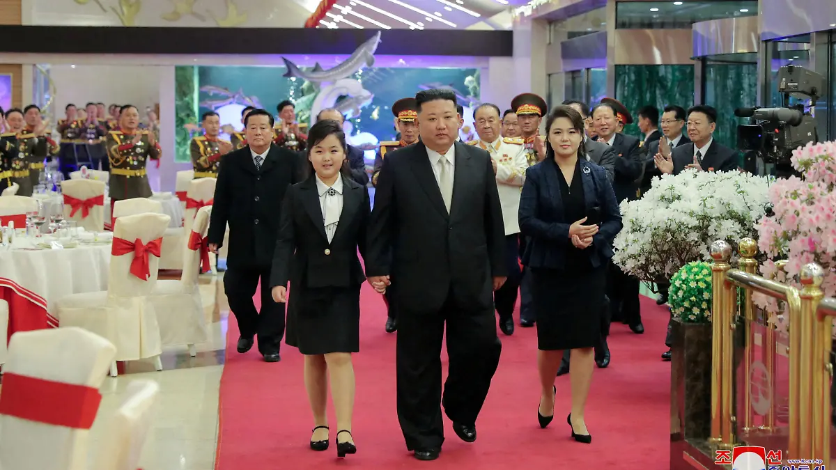 North Korean leader Kim Jong Un walks with his daughter Kim Ju Ae and his wife Ri Sol Ju while attending a banquet to celebrate the 75th anniversary of the Korean People's Army the following day, in Pyongyang, North Korea February 7, 2023 in this photo released February 8, 2023 by North Korea's Korean Central News Agency (KCNA). KCNA via REUTERS ATTENTION EDITORS - THIS IMAGE WAS PROVIDED BY A THIRD PARTY. REUTERS IS UNABLE TO INDEPENDENTLY VERIFY THIS IMAGE. NO THIRD PARTY SALES. SOUTH KOREA OUT. NO COMMERCIAL OR EDITORIAL SALES IN SOUTH KOREA.
