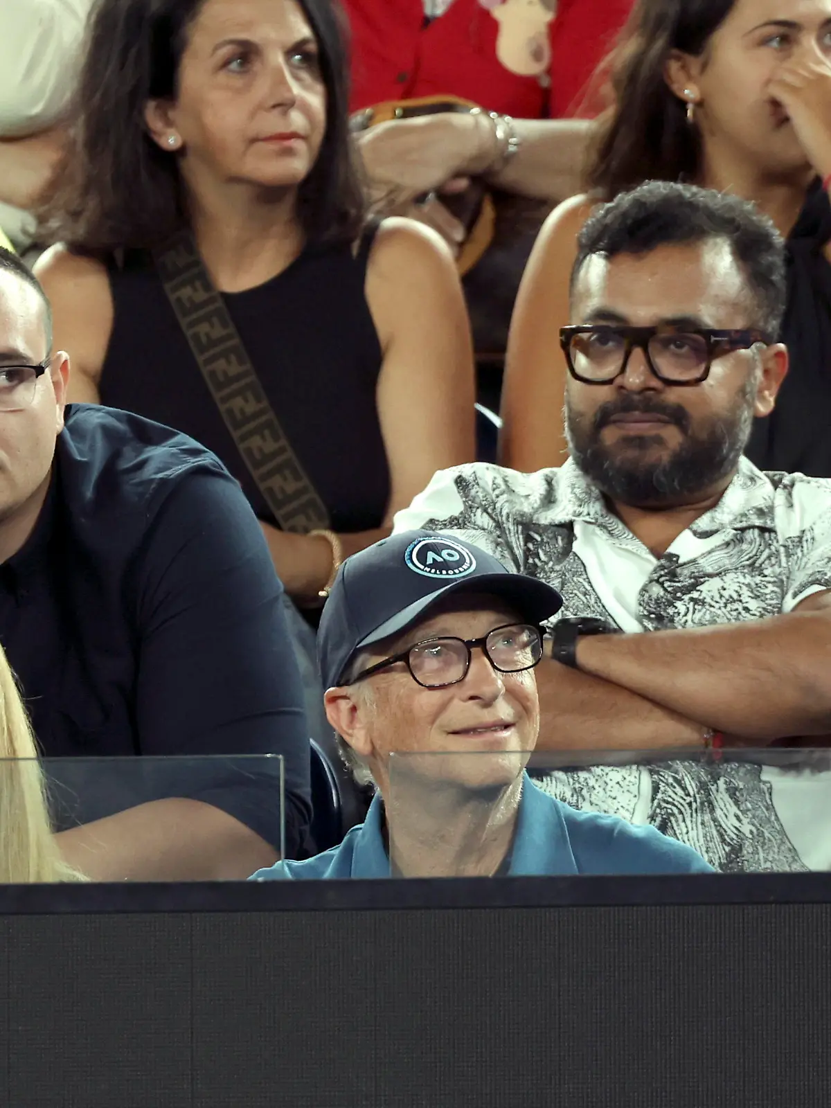 (230129) -- MELBOURNE, Jan. 29, 2023 (Xinhua) -- Bill Gates (front C), co-founder of Microsoft company and co-founder of Bill and Melinda Gates Foundation, watches the men's singles final match between Novak Djokovic of Serbia and Stefanos Tsitsipas of Greece at Australian Open tennis tournament, in Melbourne, Australia, Jan. 29, 2023. (Xinhua/Bai Xuefei)