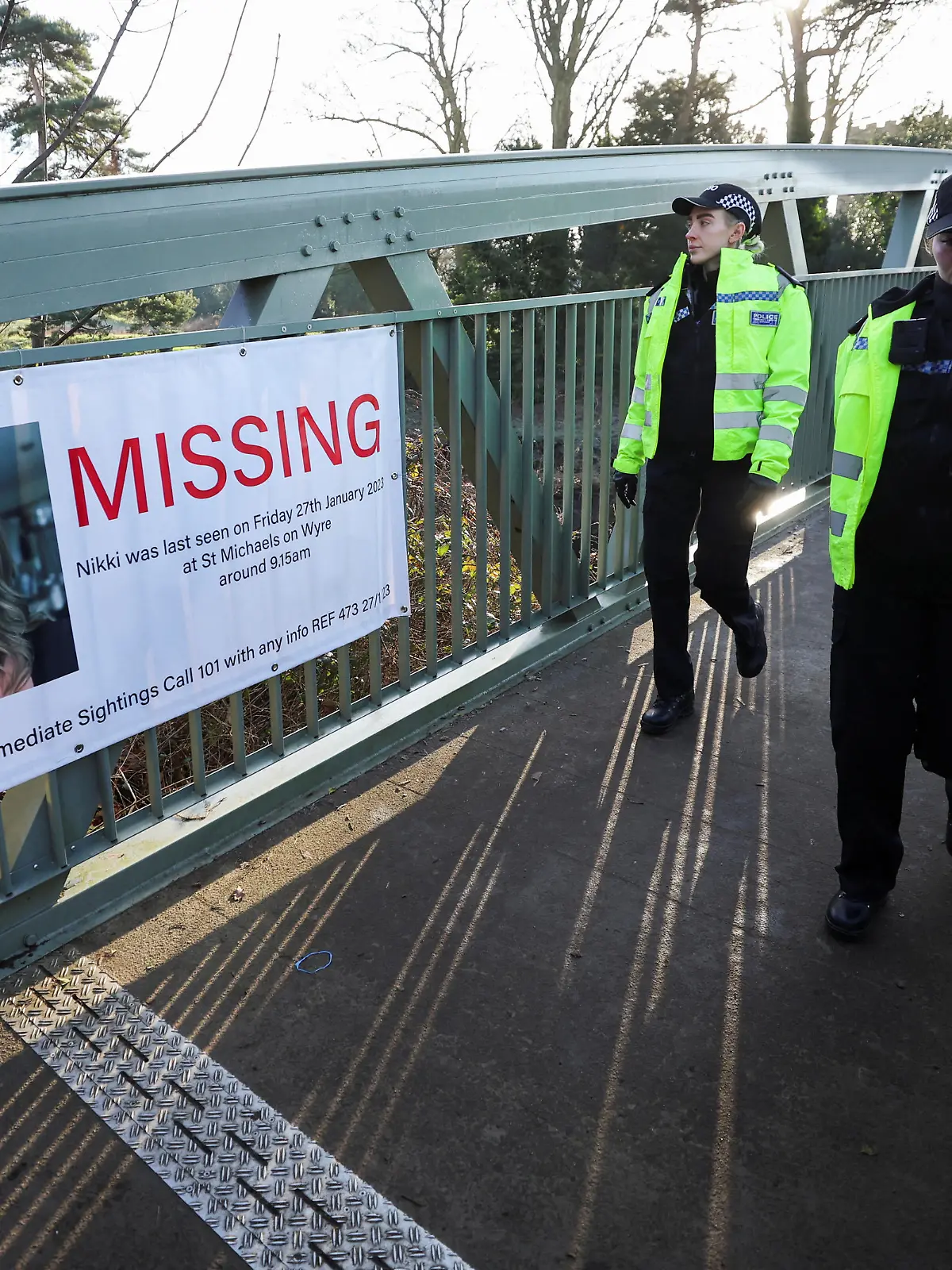Police officers walk as they continue to search River Wyre for Nicola Bulley who is currently missing in Lancashire, Britain February 6, 2023. REUTERS/Phil Noble