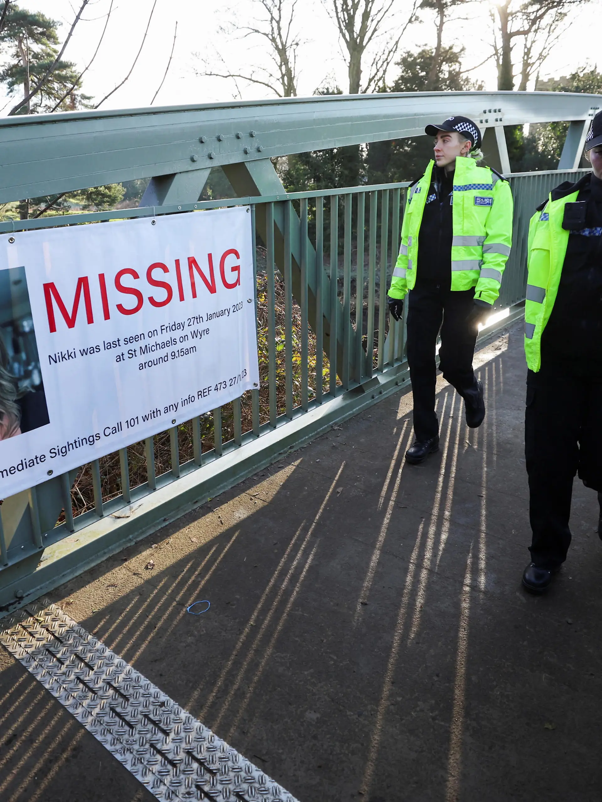 Police officers walk as they continue to search River Wyre for Nicola Bulley who is currently missing in Lancashire, Britain February 6, 2023. REUTERS/Phil Noble