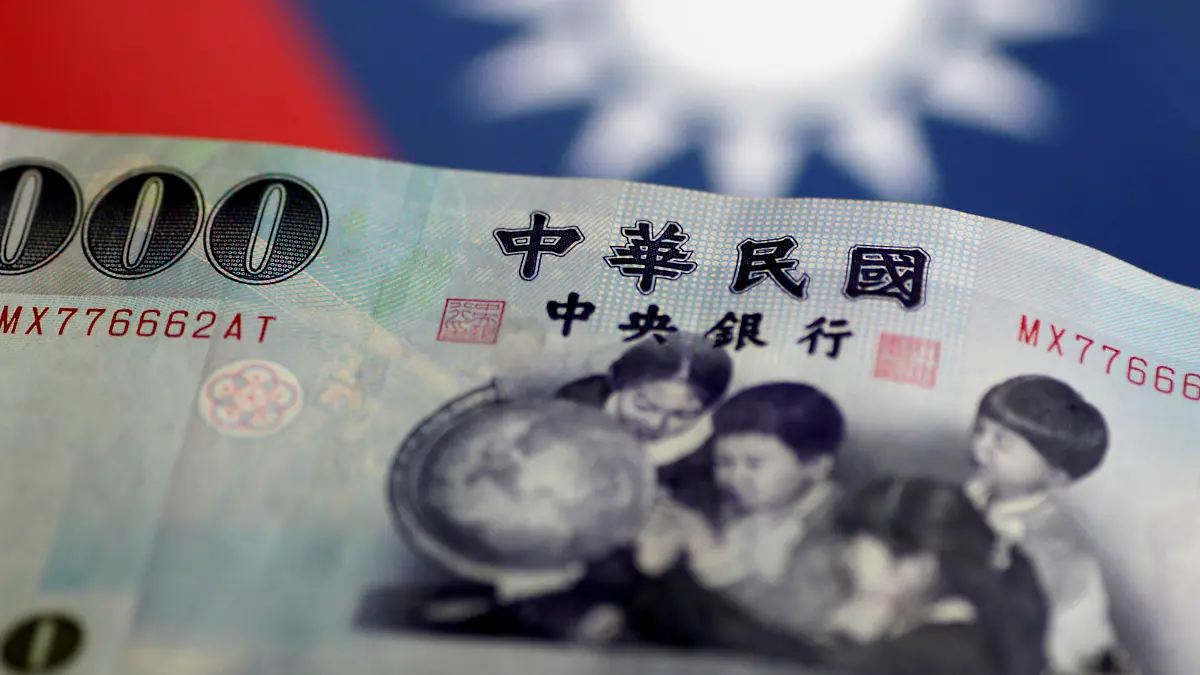 FILE PHOTO: A Taiwan dollar note is seen in this illustration photo May 31, 2017. REUTERS/Thomas White/Illustration/File Photo