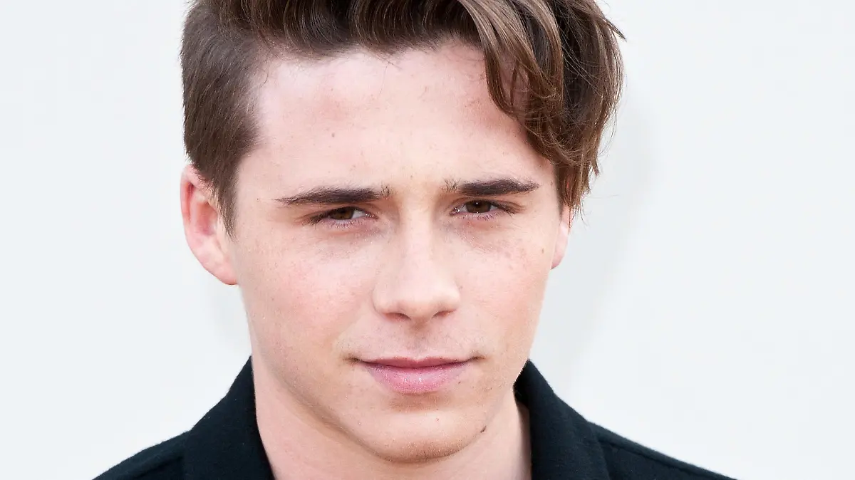 LONDON, ENGLAND - JANUARY 11:  Brooklyn Beckham attends the Burberry show during The London Collections Men AW16 at Kensington Gardens on January 11, 2016 in London, England.  (Photo by Eamonn M. McCormack/Getty Images)