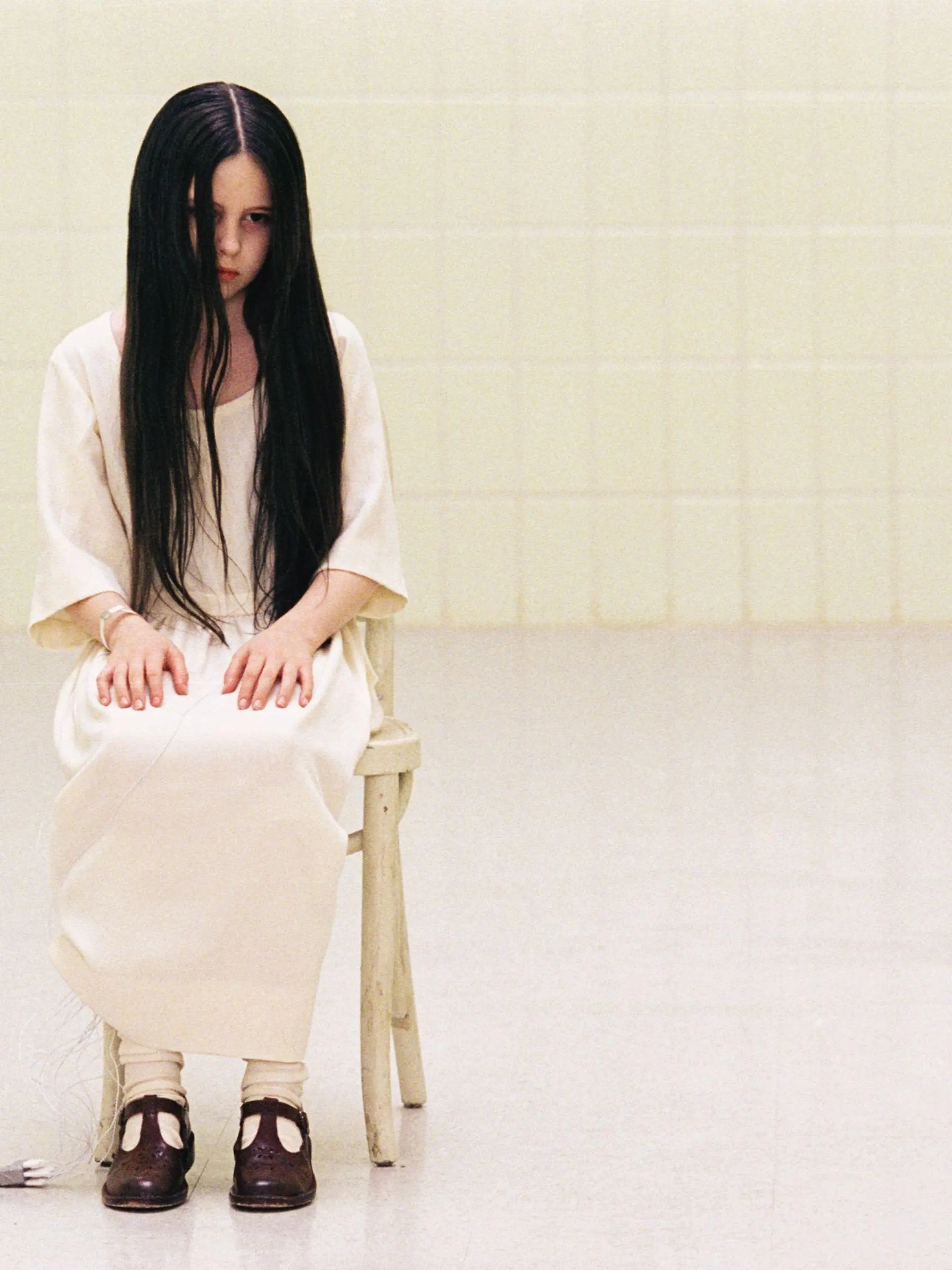 Quality: Original.   Film Title:  The Ring.    The fate of a mysterious little girl named Samara (DAVEIGH CHASE) is somehow at the center of an urban legend about a videotape that dooms anyone who watches it to death in seven days in DreamWorks Pictures' horror thiller THE RING.   Photo Credit: Merrick Morton.  Copyright: TM & © 2002 DREAMWORKS LLC