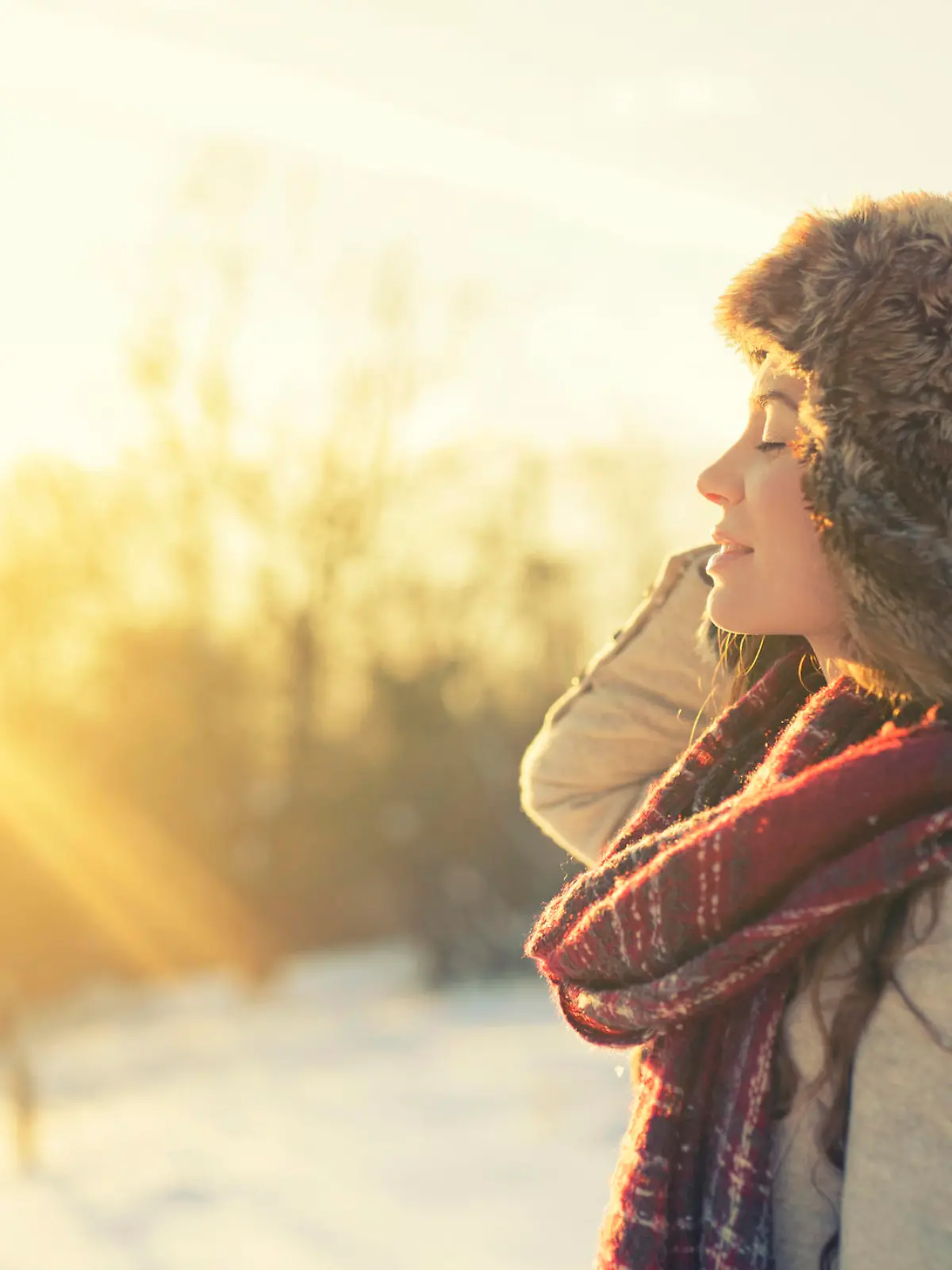 Woman enjoying a winter day on mountains