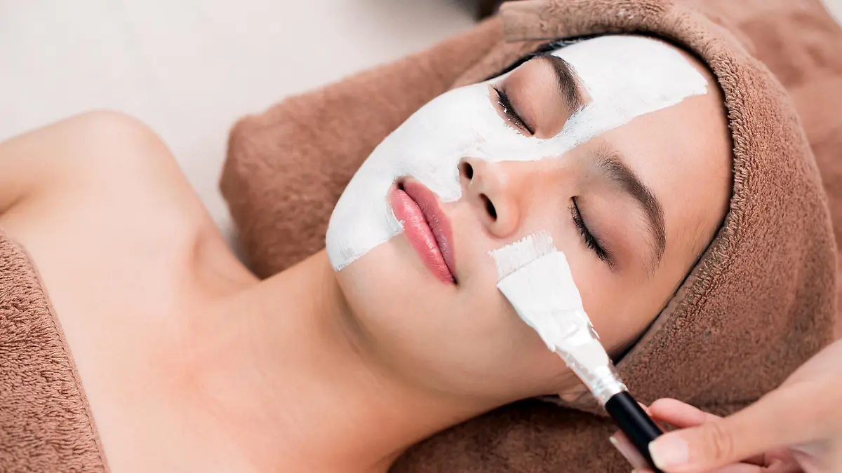 Process of cleansing face with spa mask