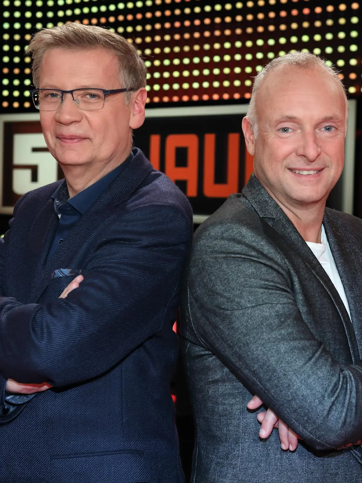 Günther Jauch und Moderator Frank "Buschi" Buschmann