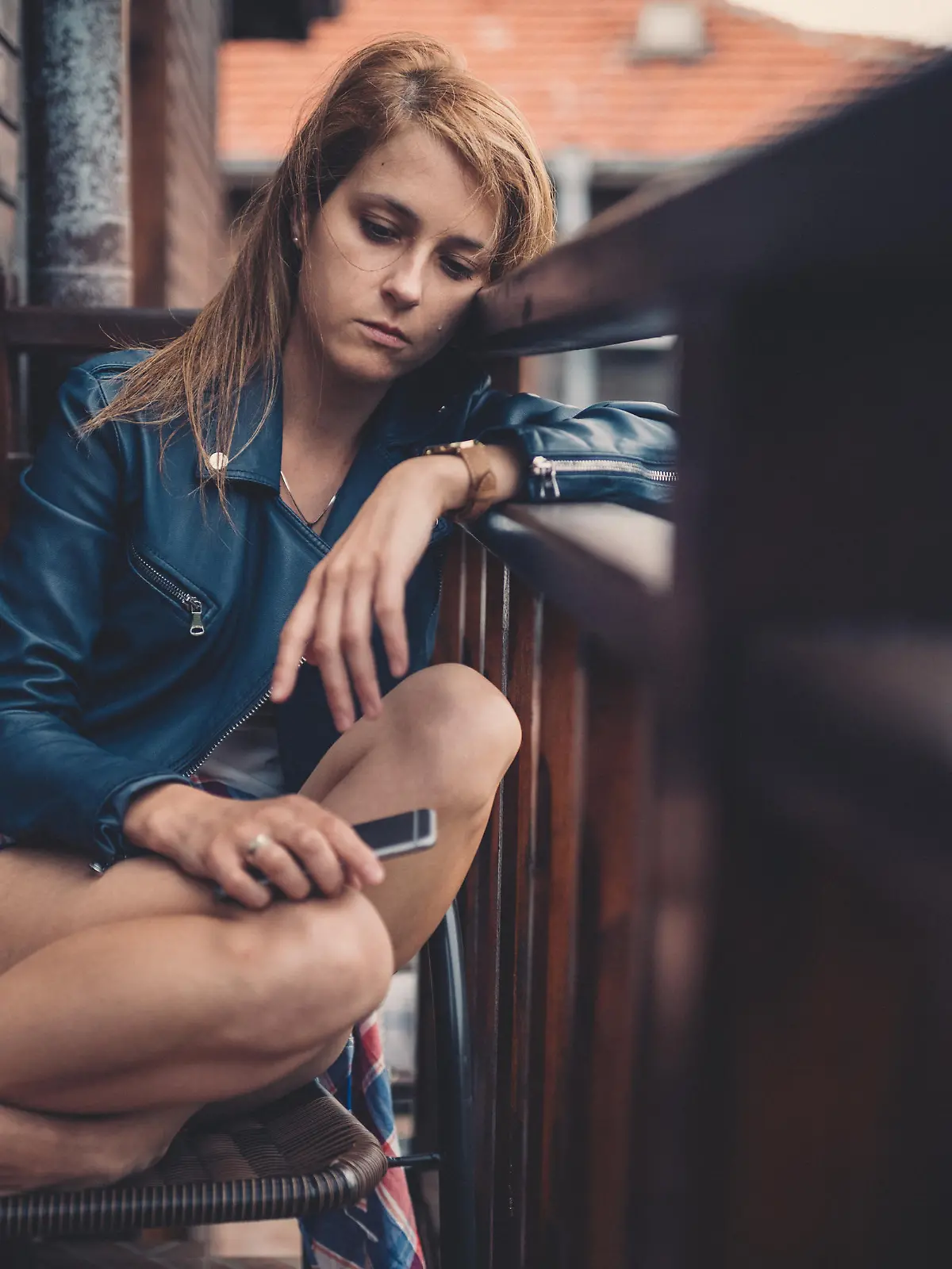 Sad woman crying at the terrace