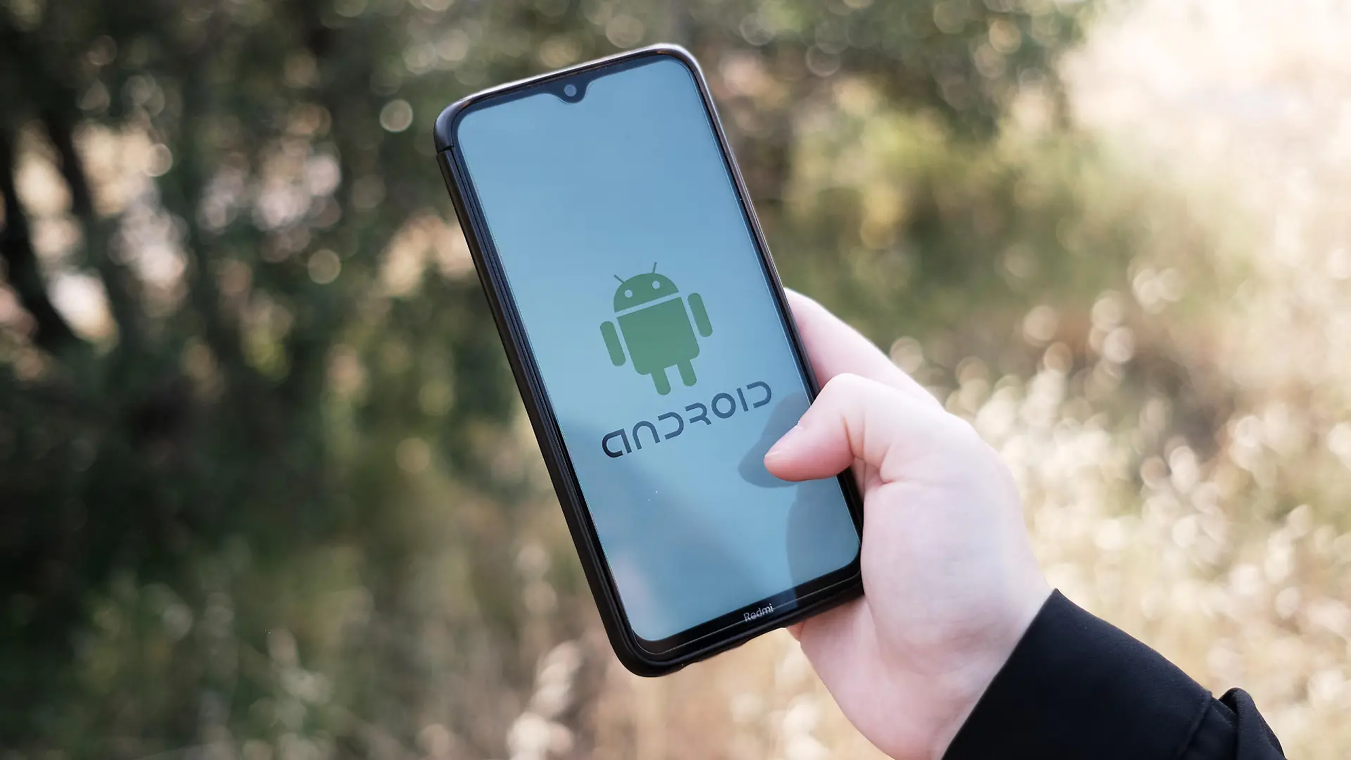 In this photo illustration an Android logo seen displayed on a smartphone screen in Athens, Greece on May 7, 2023. (Photo illustration by Nikolas Kokovlis/NurPhoto)