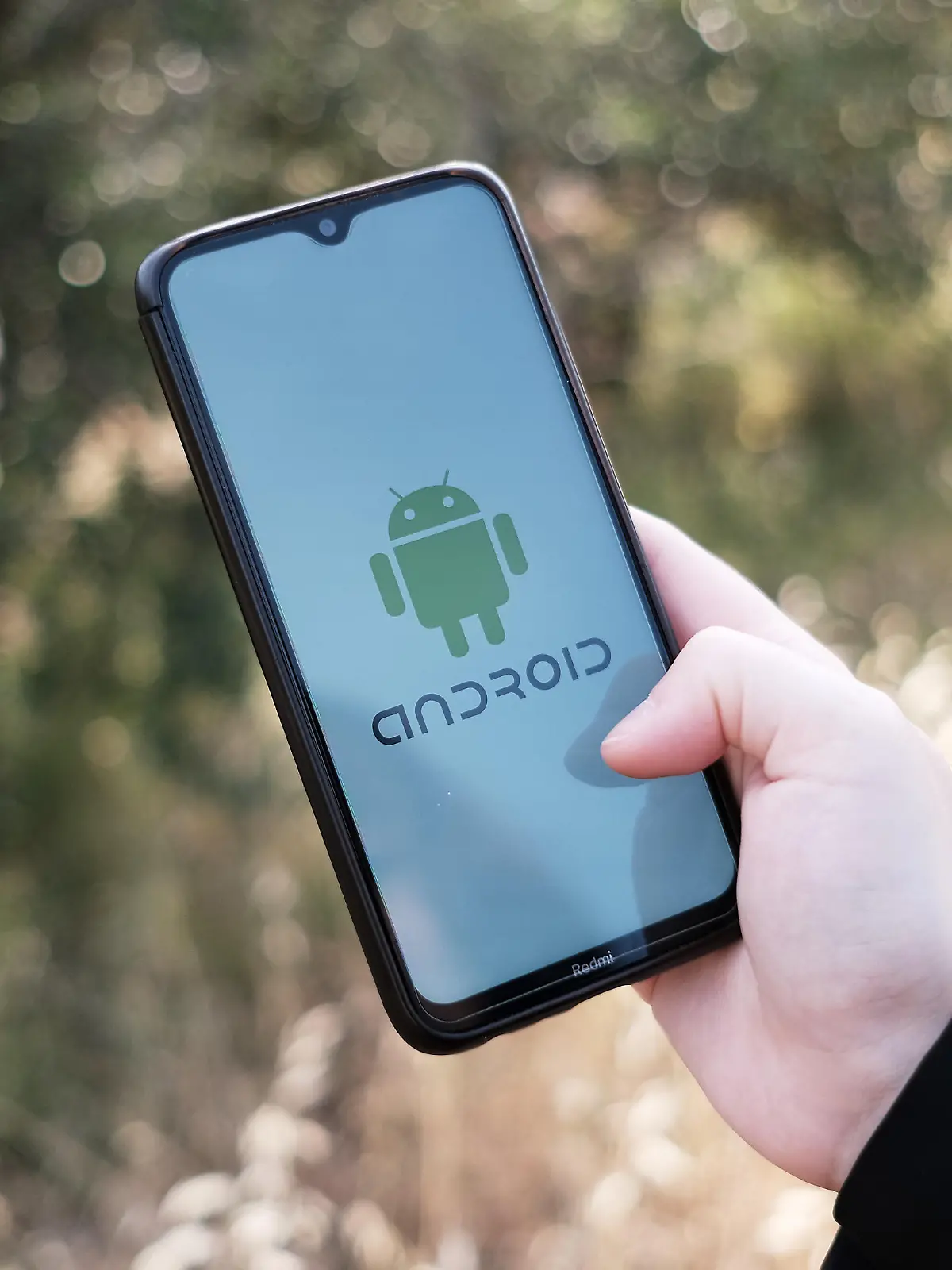 In this photo illustration an Android logo seen displayed on a smartphone screen in Athens, Greece on May 7, 2023. (Photo illustration by Nikolas Kokovlis/NurPhoto)