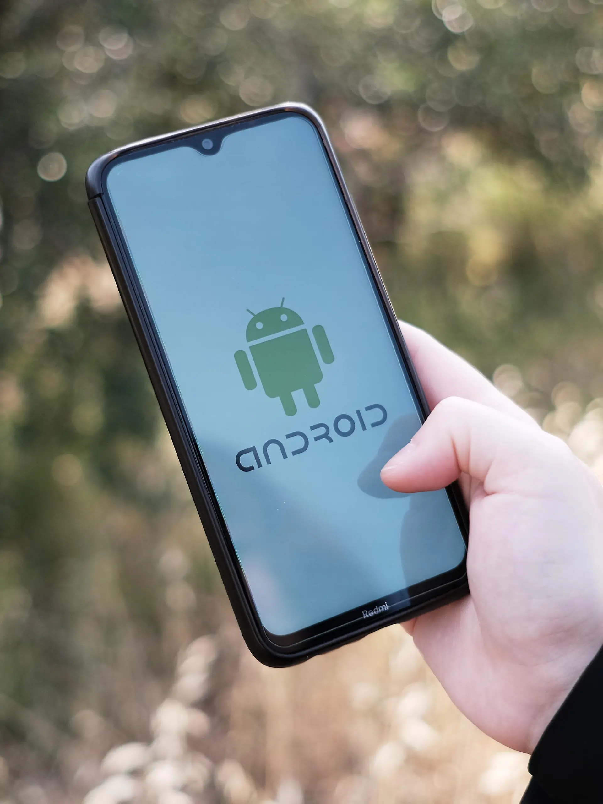 In this photo illustration an Android logo seen displayed on a smartphone screen in Athens, Greece on May 7, 2023. (Photo illustration by Nikolas Kokovlis/NurPhoto)