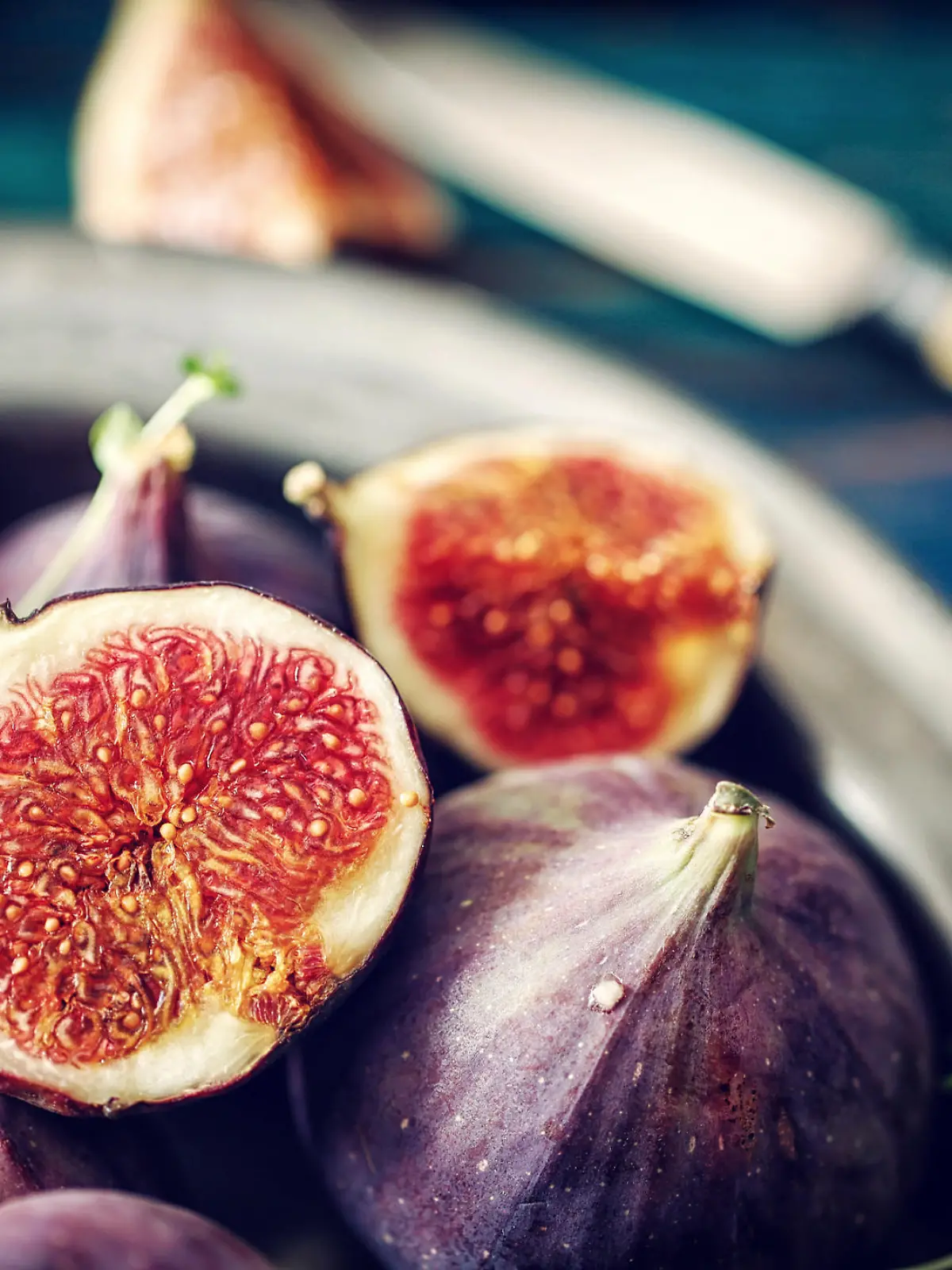 Figs and Sweet Honey on Wooden Background