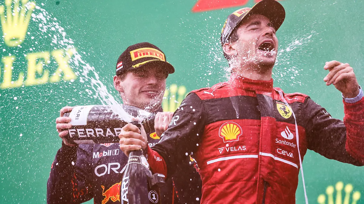Formula 1 2022: Austrian GP RED BULL RING, AUSTRIA - JULY 10: Max Verstappen, Red Bull Racing, 2nd position, sprays Champagne at Charles Leclerc, Ferrari, 1st position, on the podium during the Austrian GP at Red Bull Ring on Sunday July 10, 2022 in Spielberg, Austria. Photo by Glenn Dunbar / LAT Images Images PUBLICATIONxINxGERxSUIxAUTxHUNxONLY GP2211_154148177A5276