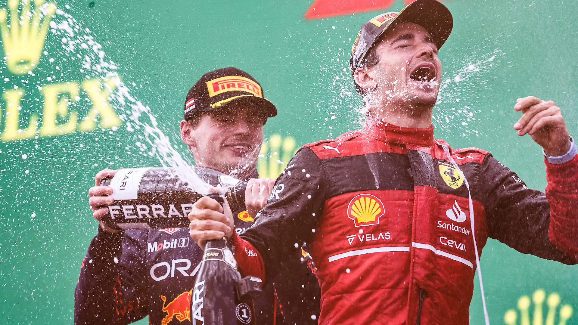 Formula 1 2022: Austrian GP RED BULL RING, AUSTRIA - JULY 10: Max Verstappen, Red Bull Racing, 2nd position, sprays Champagne at Charles Leclerc, Ferrari, 1st position, on the podium during the Austrian GP at Red Bull Ring on Sunday July 10, 2022 in Spielberg, Austria. Photo by Glenn Dunbar / LAT Images Images PUBLICATIONxINxGERxSUIxAUTxHUNxONLY GP2211_154148177A5276