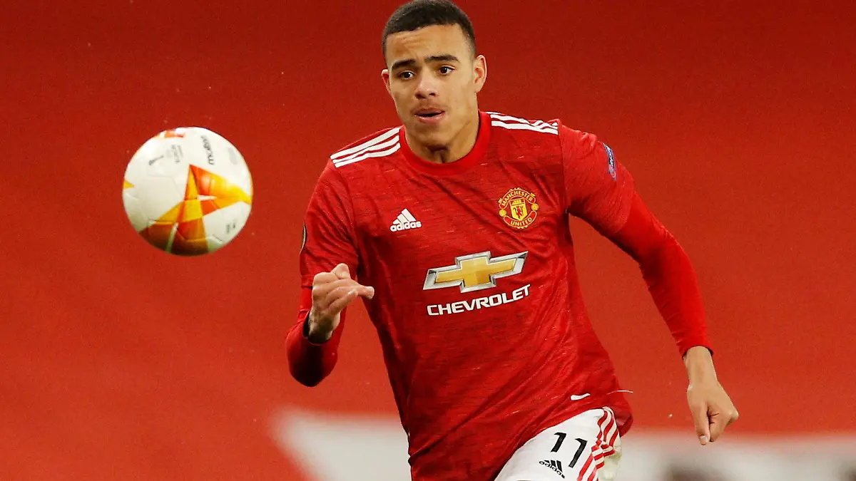 FILE PHOTO: Soccer Football - Europa League - Round of 16 First Leg - Manchester United v AC Milan - Old Trafford, Manchester, Britain - March 11, 2021 Manchester United's Mason Greenwood in action REUTERS/Phil Noble/File Photo