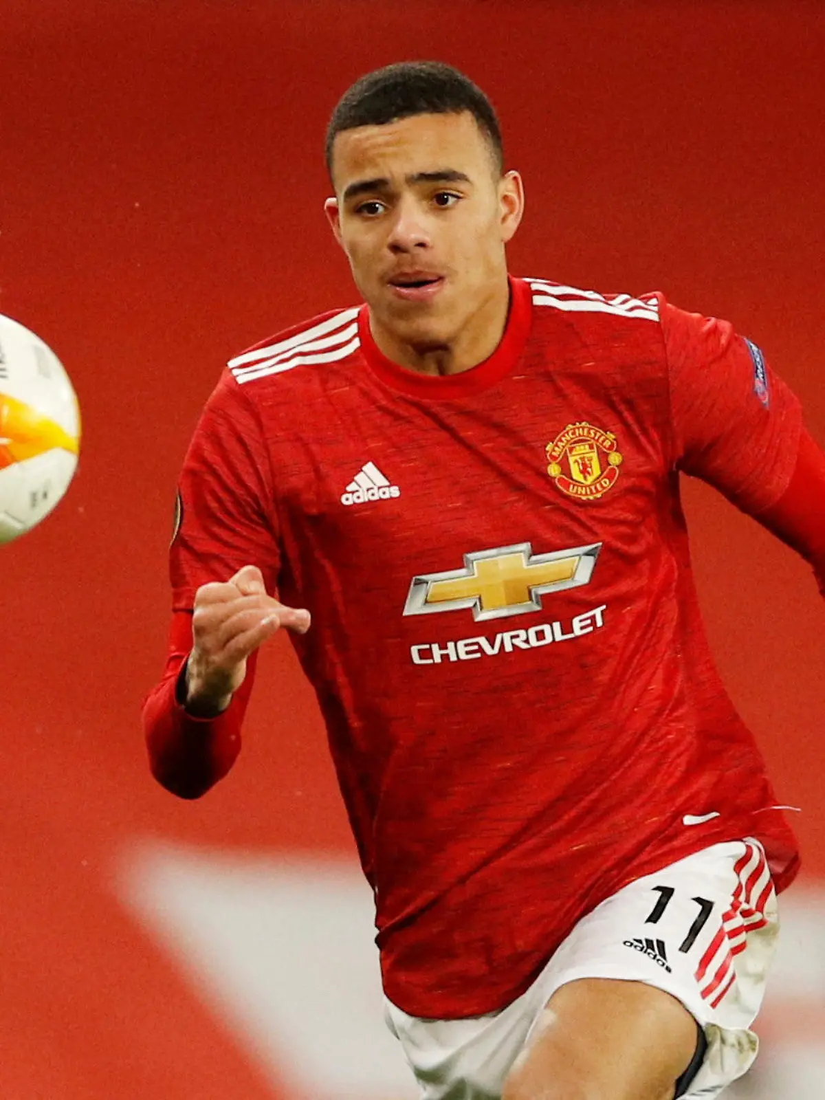 FILE PHOTO: Soccer Football - Europa League - Round of 16 First Leg - Manchester United v AC Milan - Old Trafford, Manchester, Britain - March 11, 2021 Manchester United's Mason Greenwood in action REUTERS/Phil Noble/File Photo
