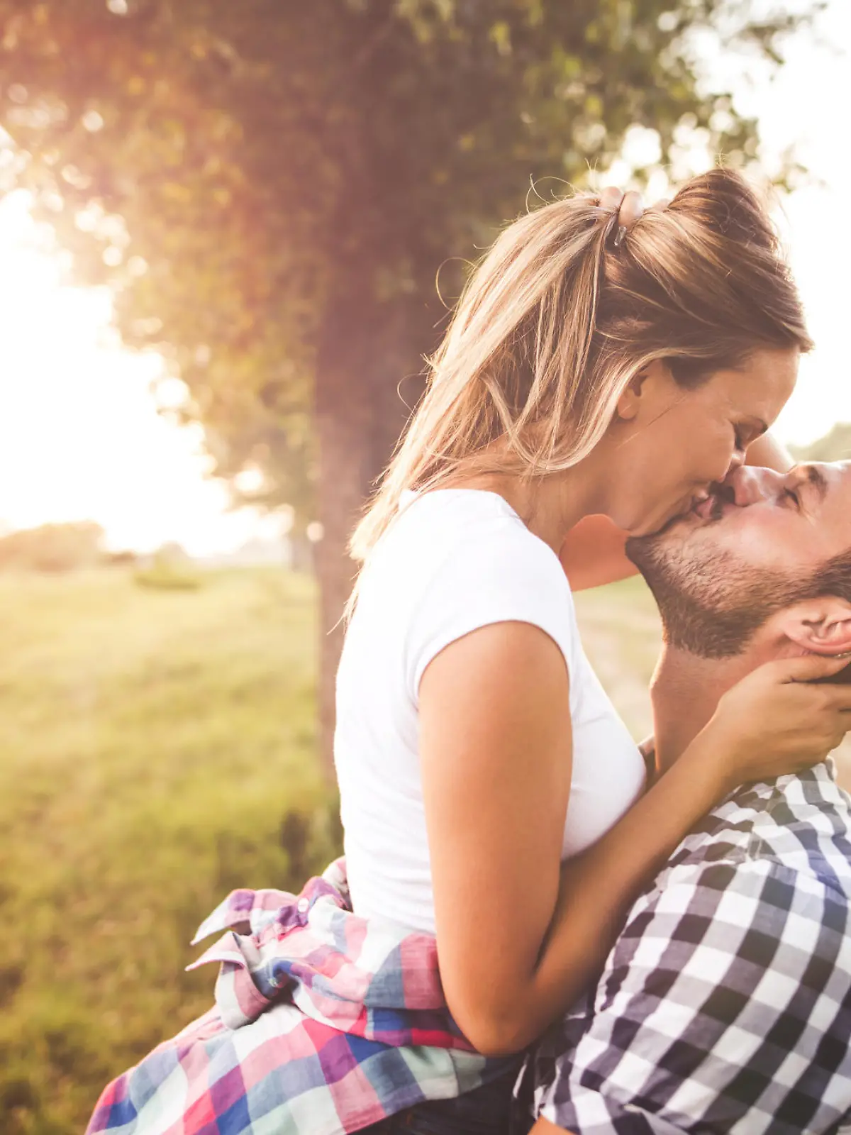 Photo of young couple enjoying in love