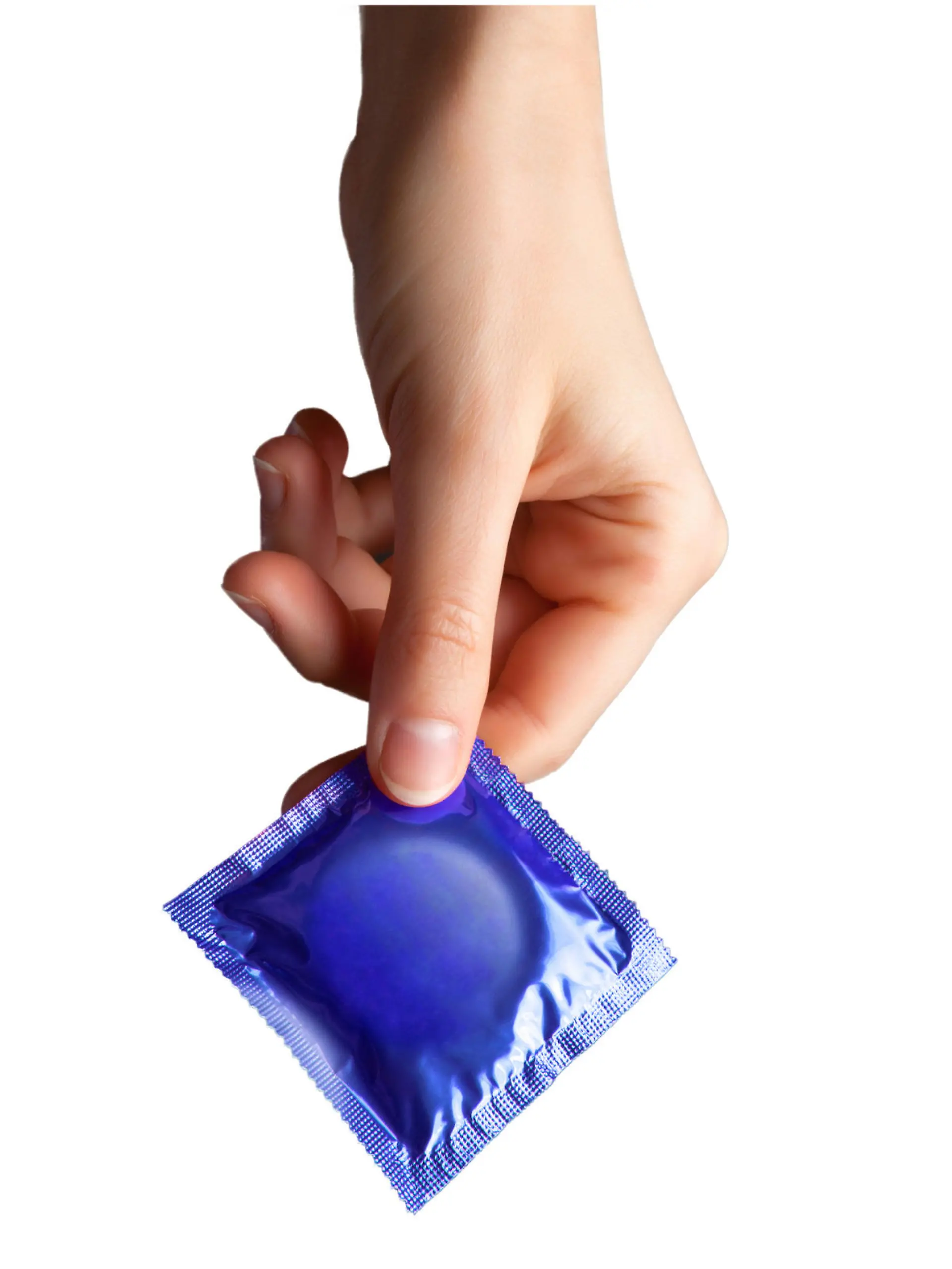 set of colored condom in female hand isolated on a white background