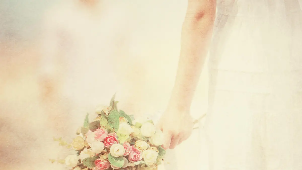 Bride with a bouquet on the beach. Vintage look.