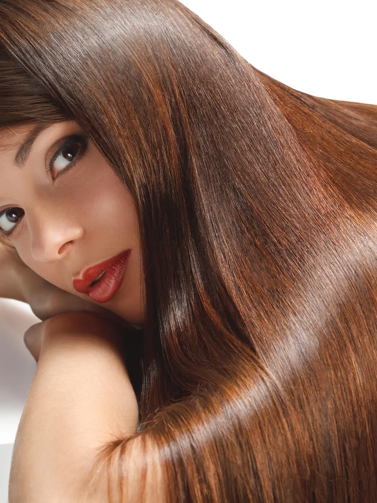 Portrait of Beautiful Woman with smooth gloss long hair. High quality image.