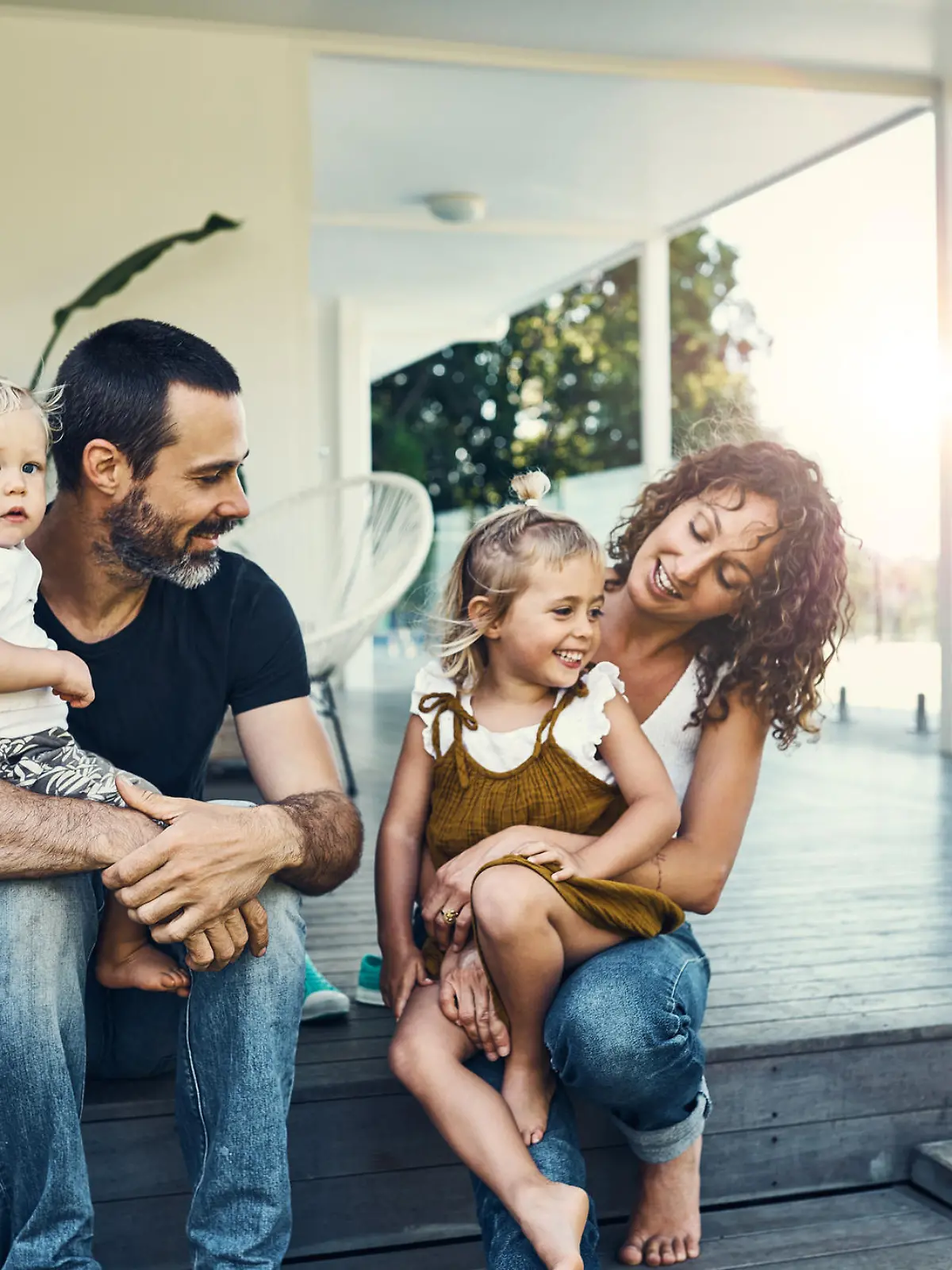 Shot of a happy young family spending the weekend together at home