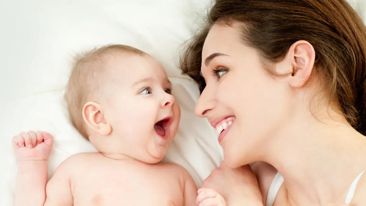 happy mother with baby