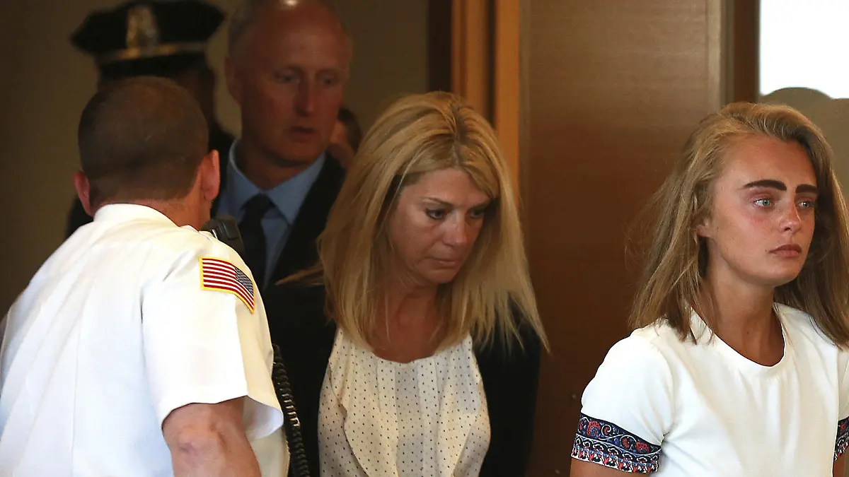 Followed by her parents, Michelle Carter arrives for her sentencing at a courtroom in Taunton, Mass., Thursday, Aug. 3, 2017, for involuntary manslaughter for encouraging Conrad Roy III to kill himself in July 2014. (Matt West/The Boston Herald via AP, Pool) |