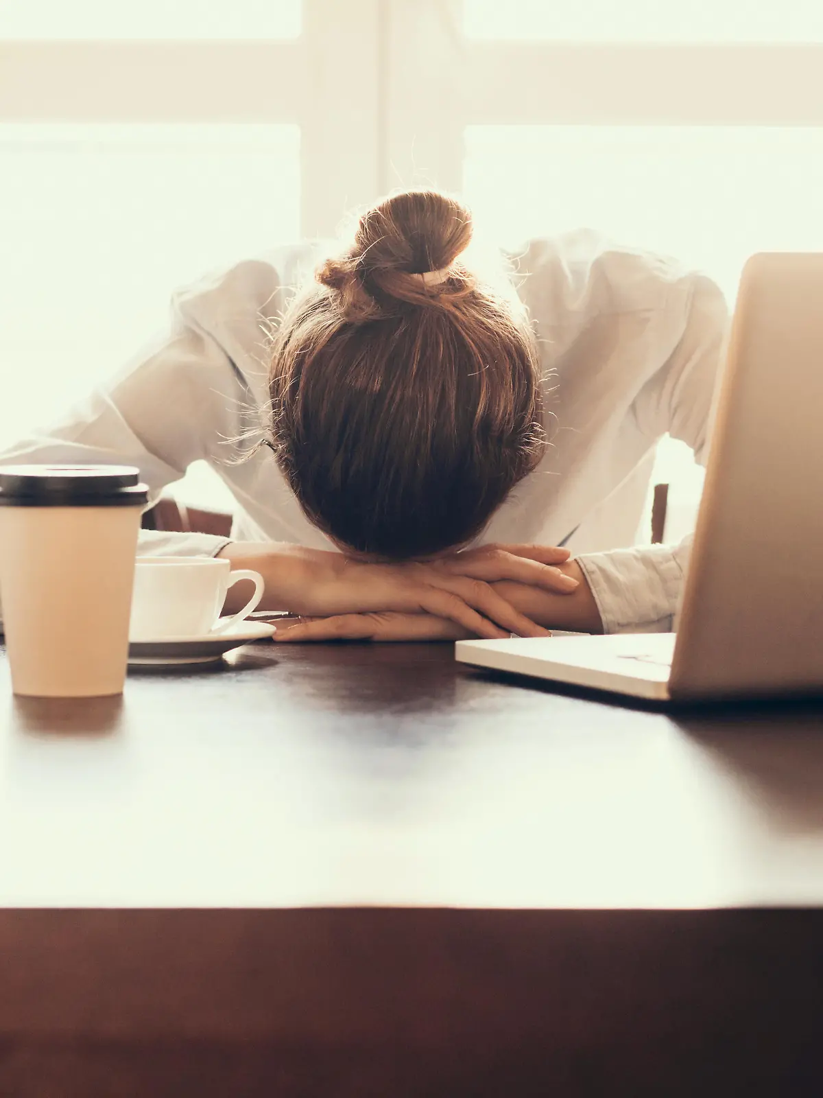 Tired businesswoman in the office