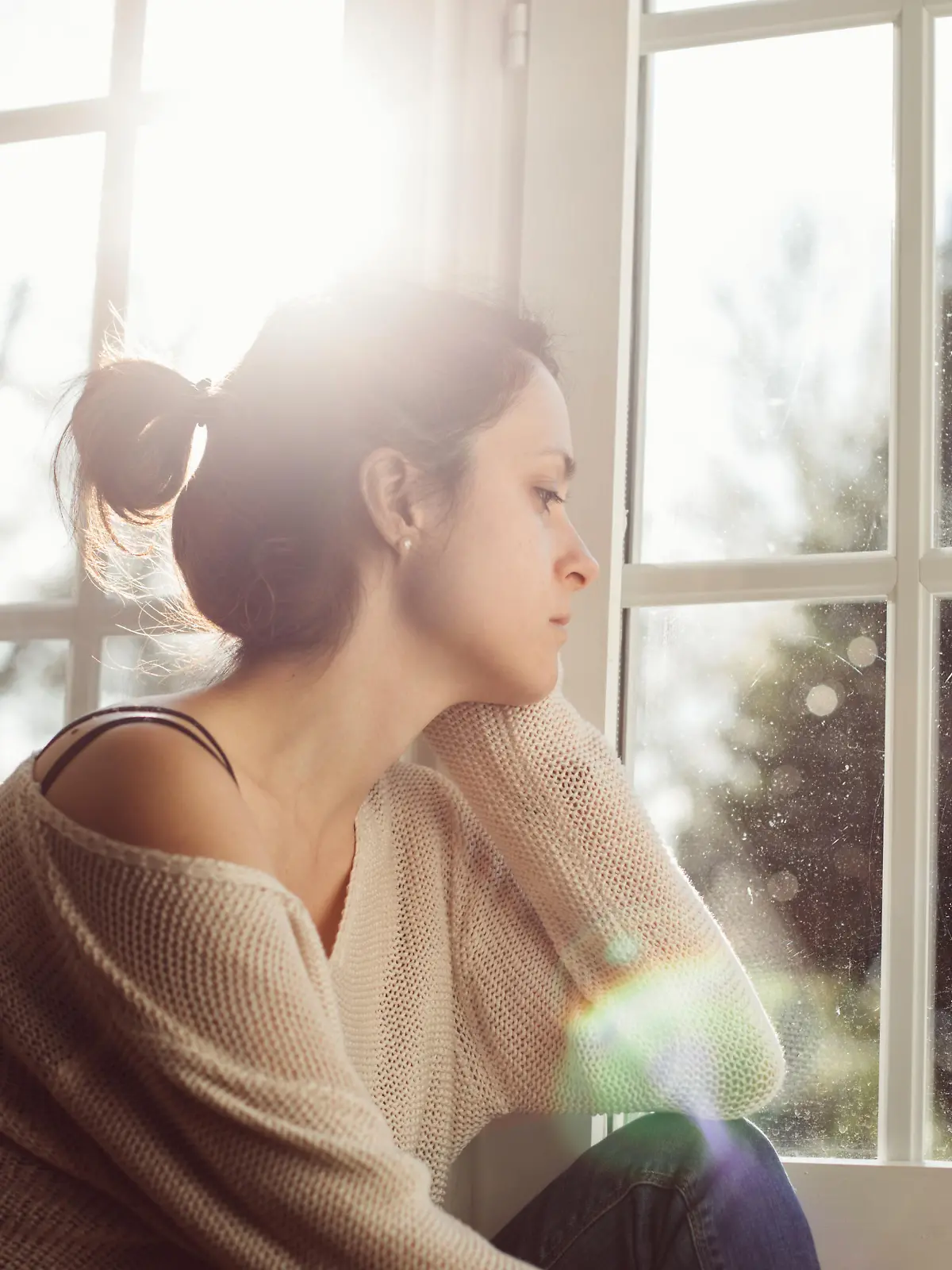 Thoughtful woman at home - copyspace