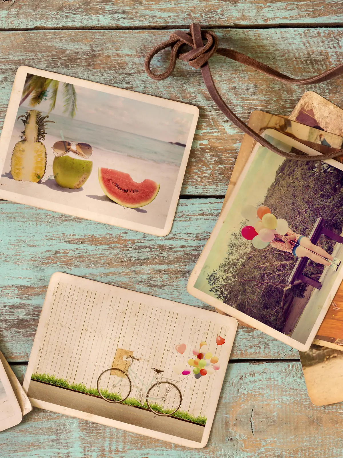 Photo album of journey honeymoon trip in summer on wood table. instant photo of retro camera - vintage and retro style