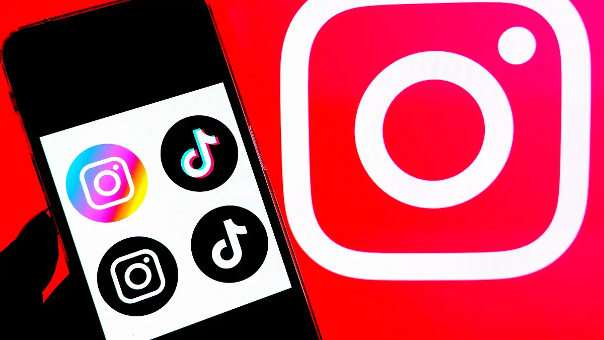 January 30, 2023, India: In this photo illustration, a Tiktok and Instagram logos seen displayed on a smartphone with an Instagram logo in the background. (Credit Image: © Avishek Das/SOPA Images via ZUMA Press Wire