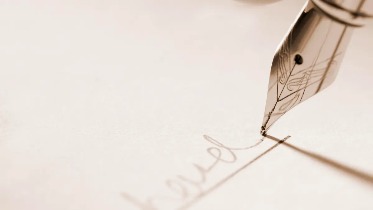 Hand signing documents with a Fountain Pen - The Signature is not real so does not require a release