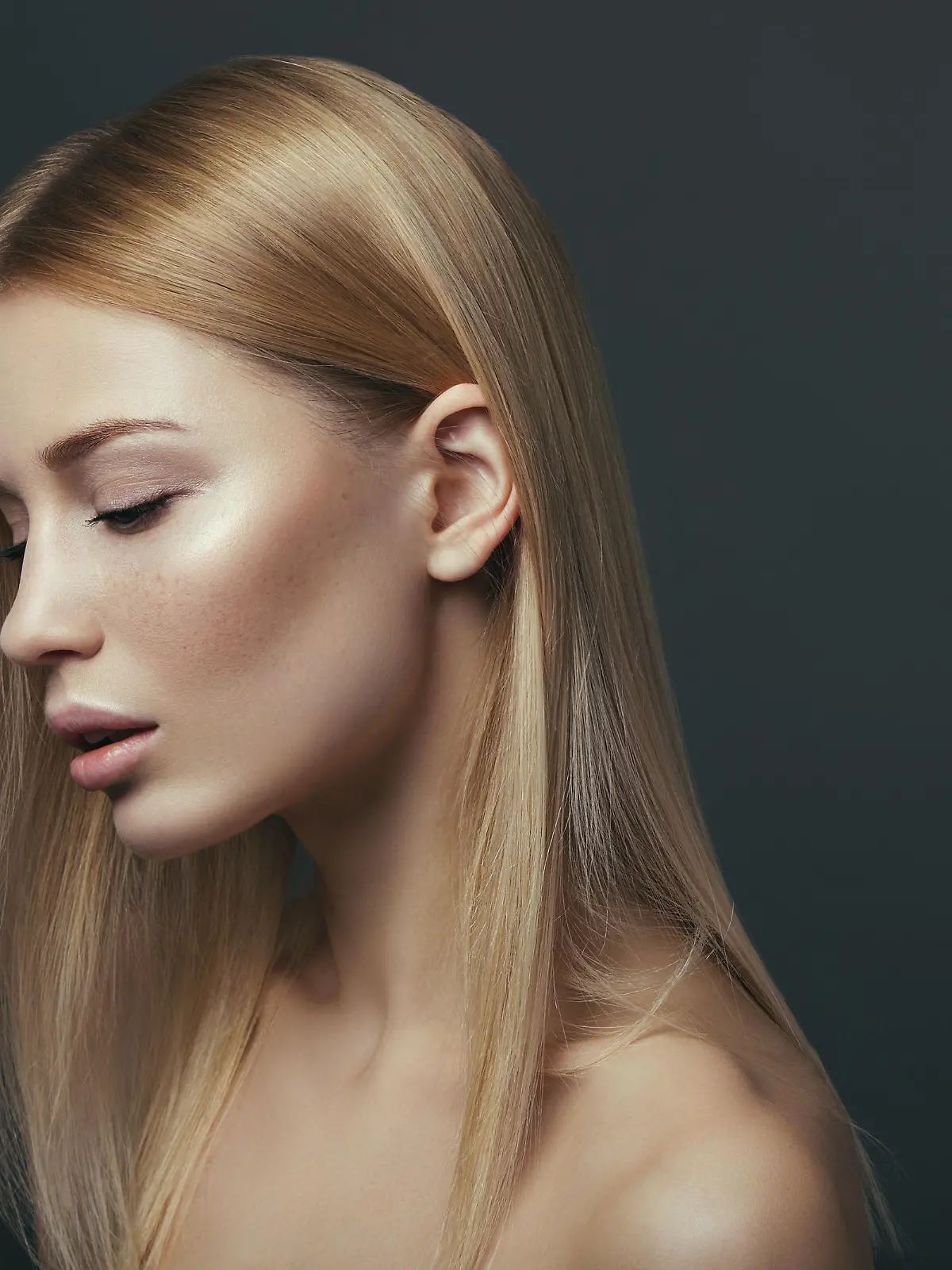 Natural portrait of beautiful blonde woman with nude make-up. High-end retouch.