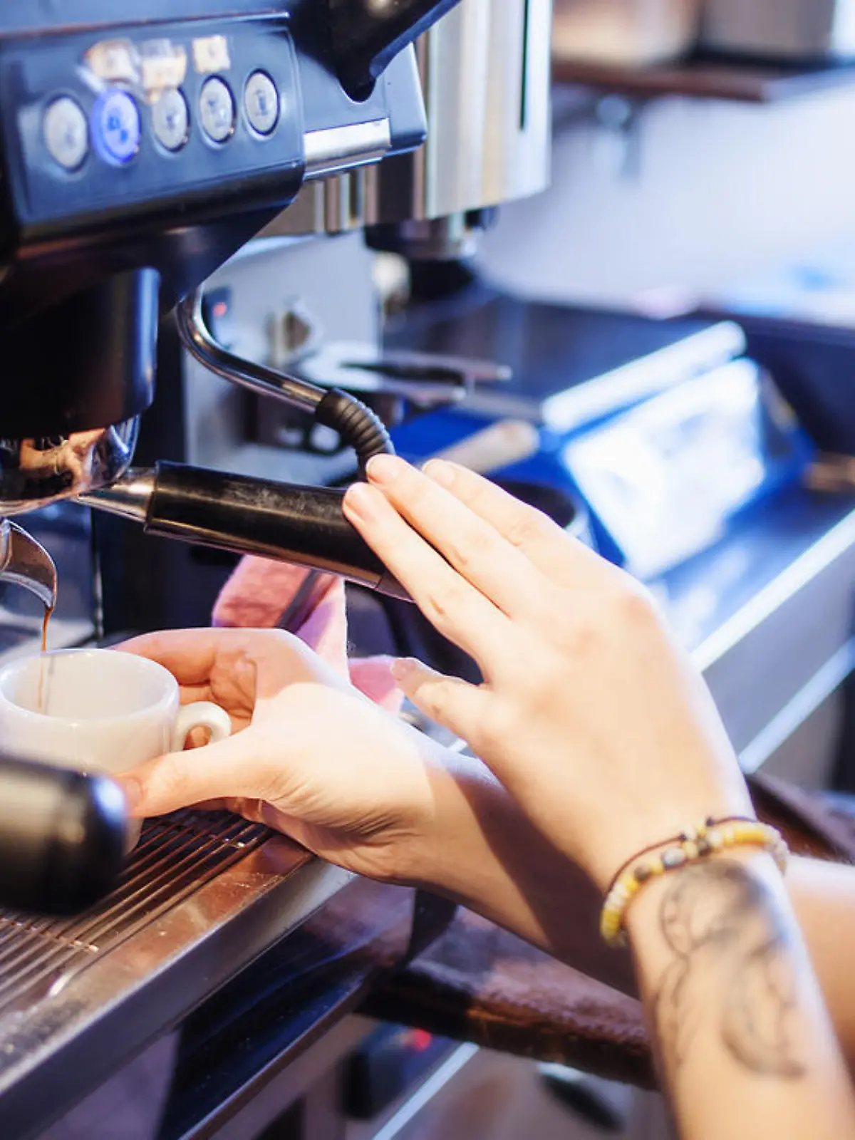 Espresso machine making coffee in pub, bar