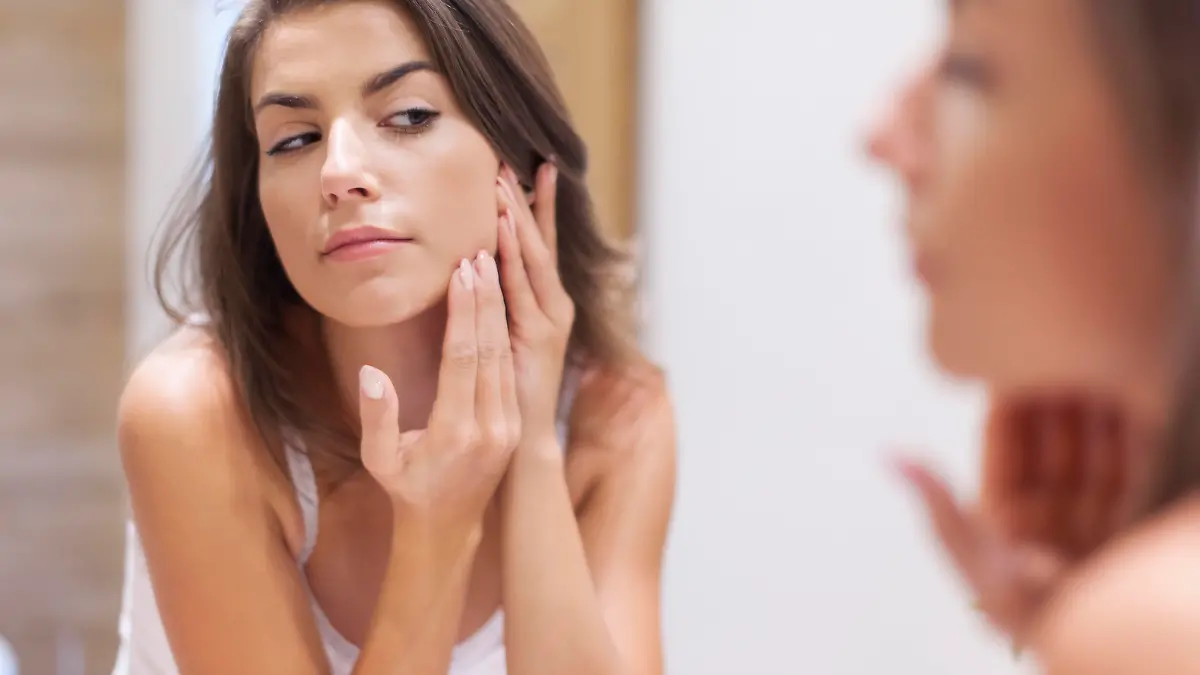 Woman taking care of her skin
