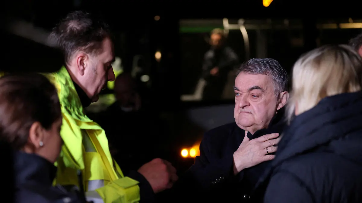 Interior Minister of the state of North Rhine-Westphalia, Herbert Reul, speaks to police officers following a train crash in Recklinghausen, Germany, February 2, 2023. REUTERS/Thilo Schmuelgen
