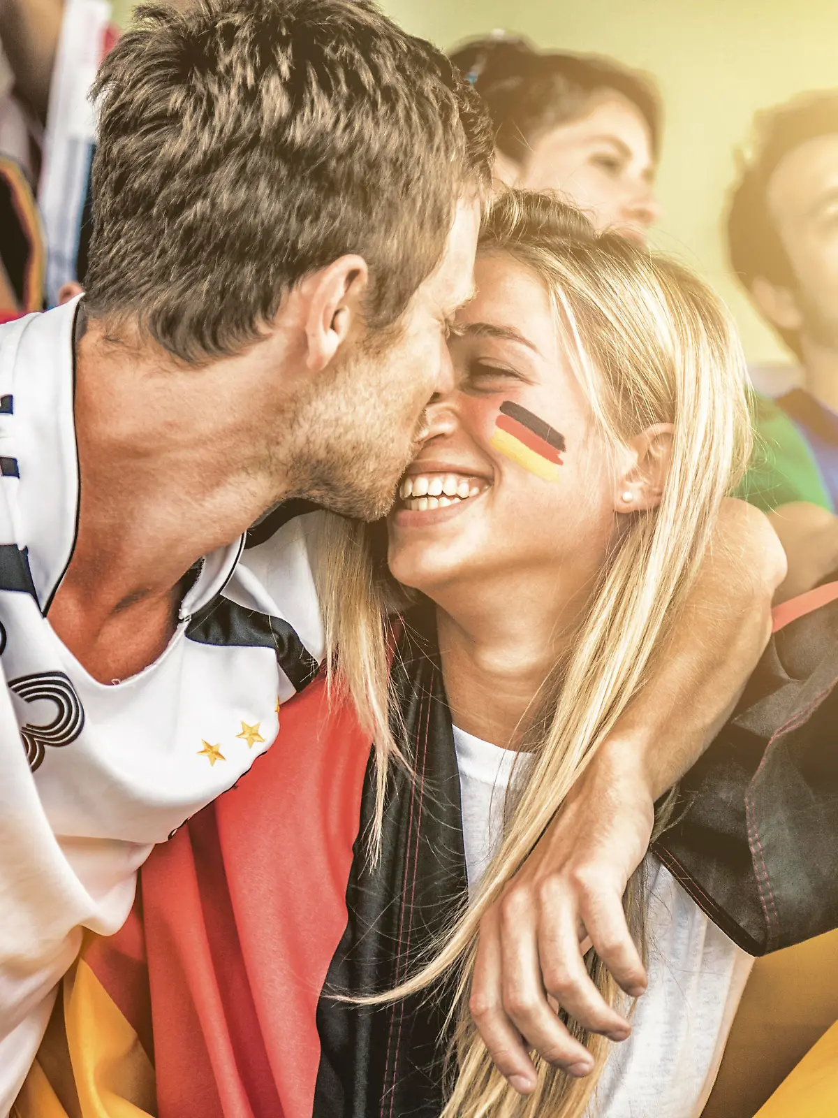 Germany fans kiss during a match.