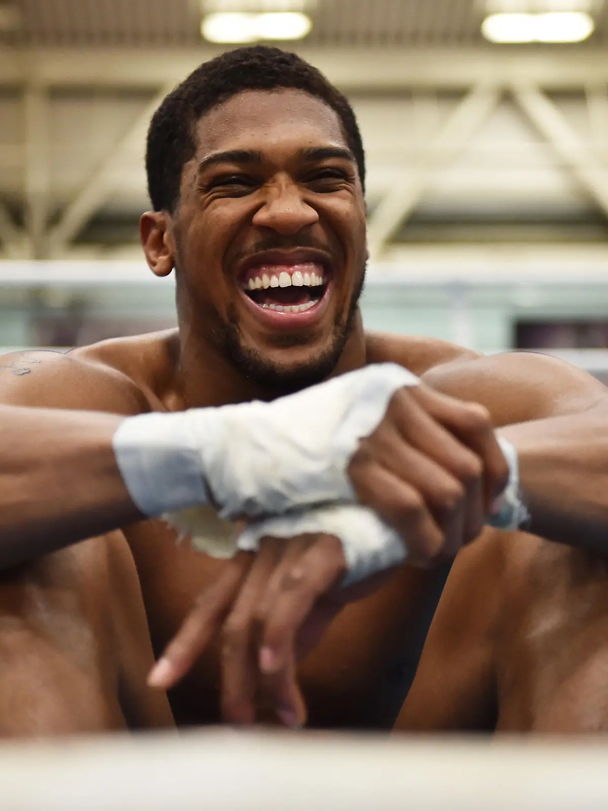 SHEFFIELD, ENGLAND - APRIL 19:  Anthony Joshua takes a break during the media workout at EIS Sheffield on April 19, 2017 in Sheffield, England.  (Photo by Dan Mullan/Getty Images)