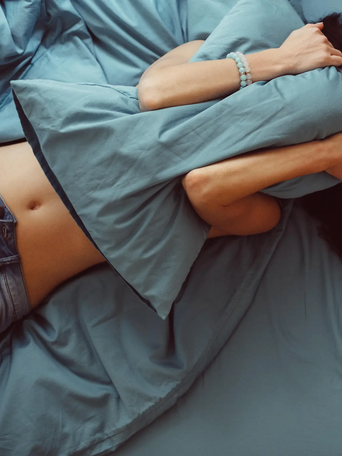 Depressed woman in bed