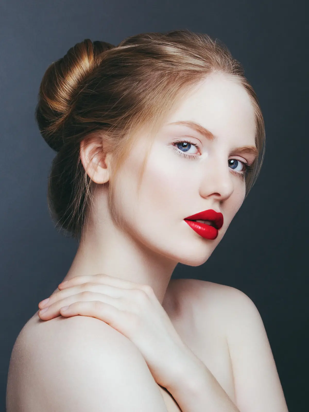 Natural portrait of beautiful blonde woman with red lips.