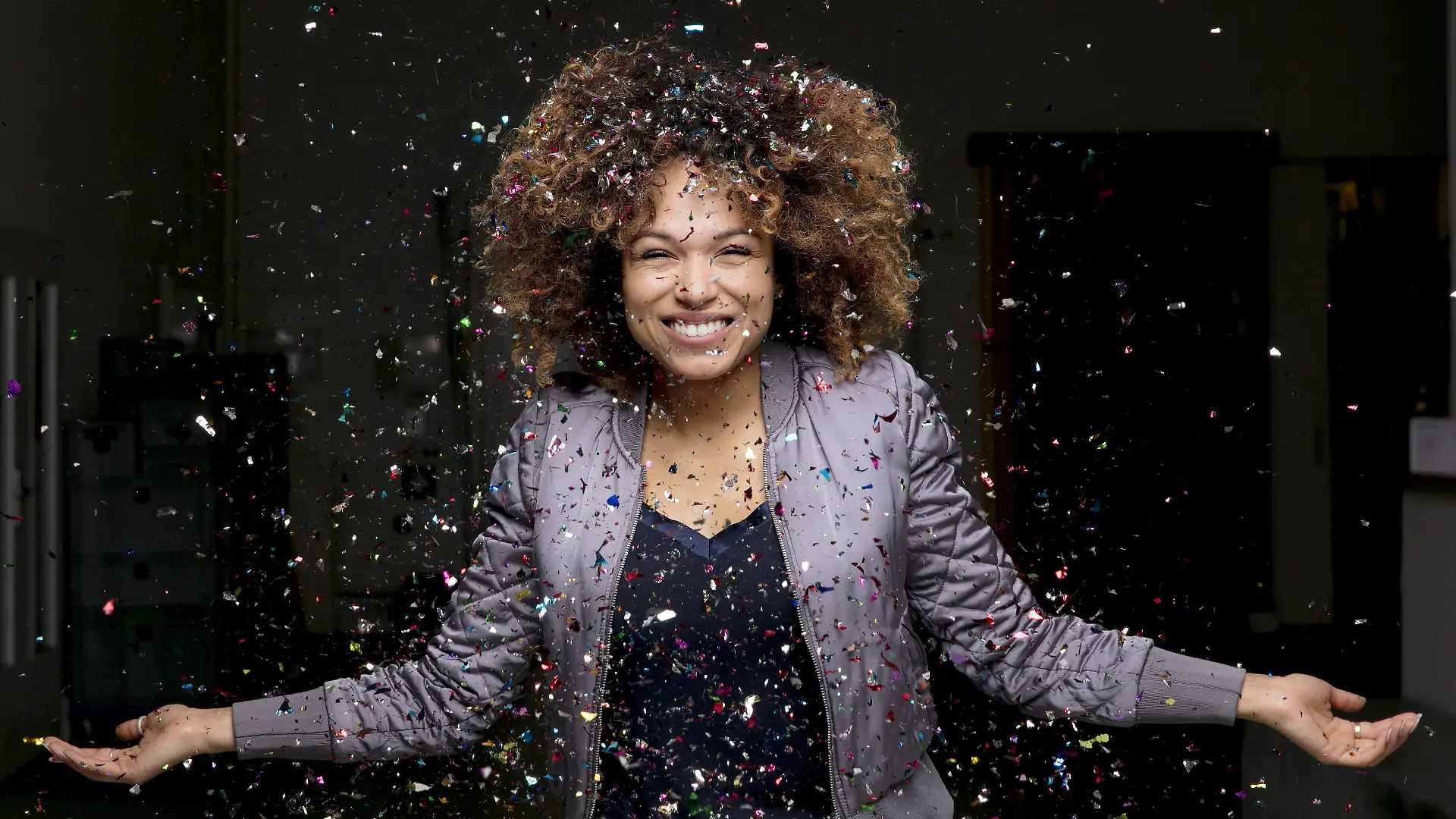 Confetti falling on happy woman model released Symbolfoto property released PUBLICATIONxINxGERxSUIxAUTxHUNxONLY HHLMF00021
