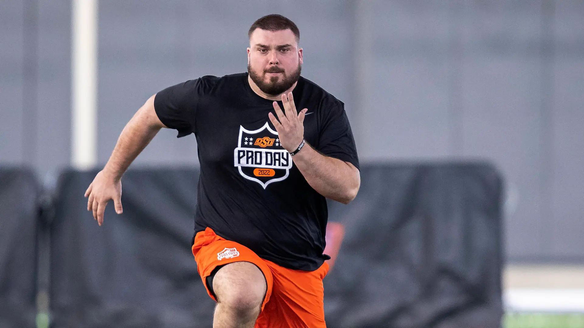 Josh Sills runs a drill during Oklahoma State football pro day in Stillwater, Okla., Thursday, March 24, 2022. (AP Photo/Alonzo Adams)