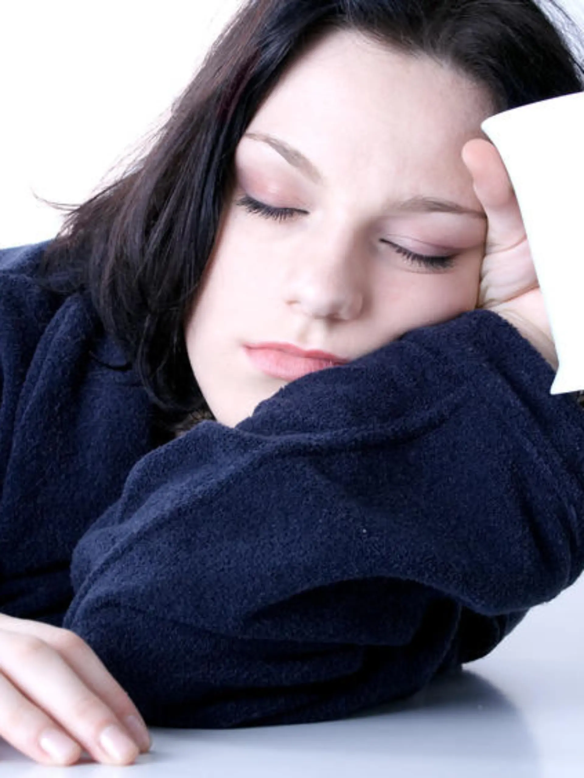 young woman awaking up early in the morning