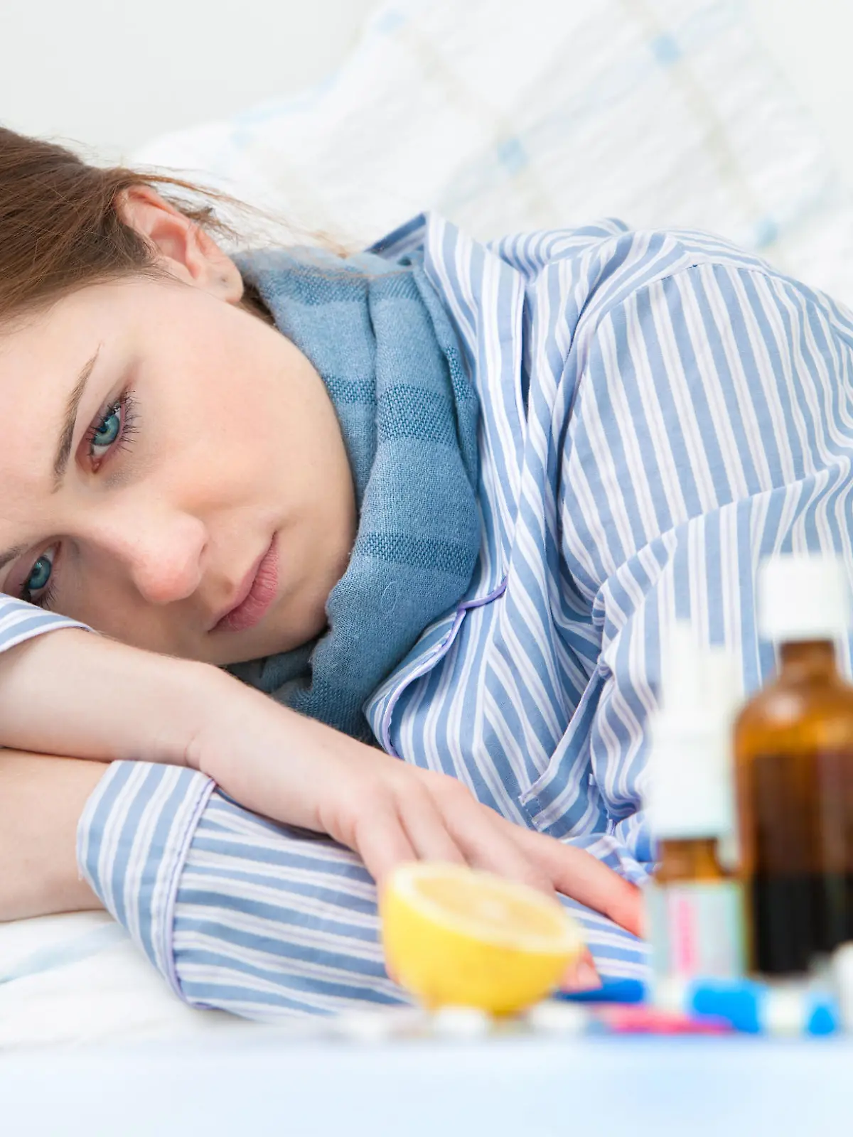 Sick woman  lying in bed with high fever. Cold, flu, fever and migraine