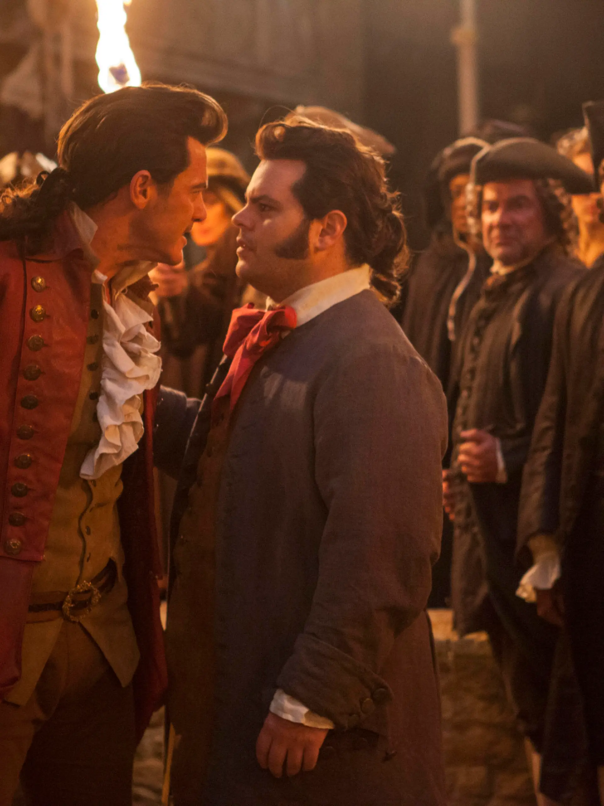 Luke Evans is Gaston and Josh Gad is LeFou, in Disney's BEAUTY AND THE BEAST, a live-action adaptation of the studio's animated classic, directed by Bill Condon.