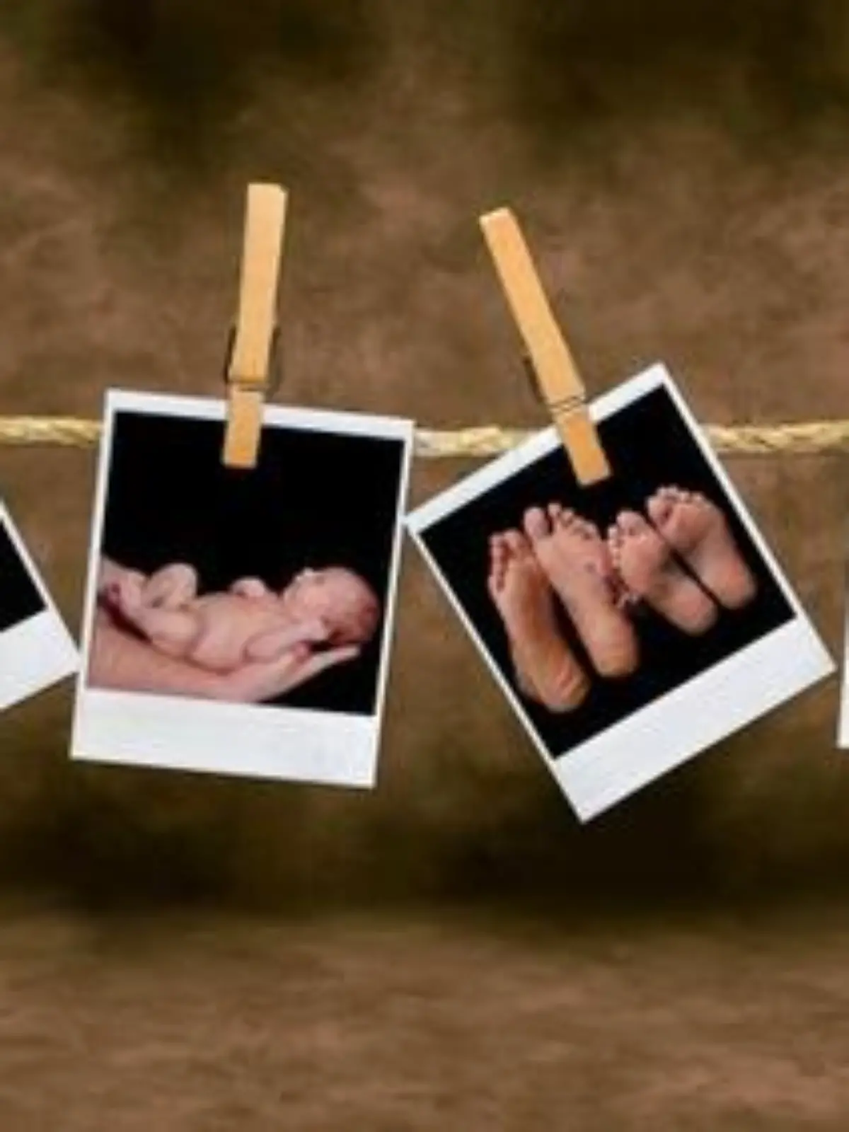 Polaroid Photos of an Newborn Infant and Pregnancy Shots Hanging on a Rope With Clothespins