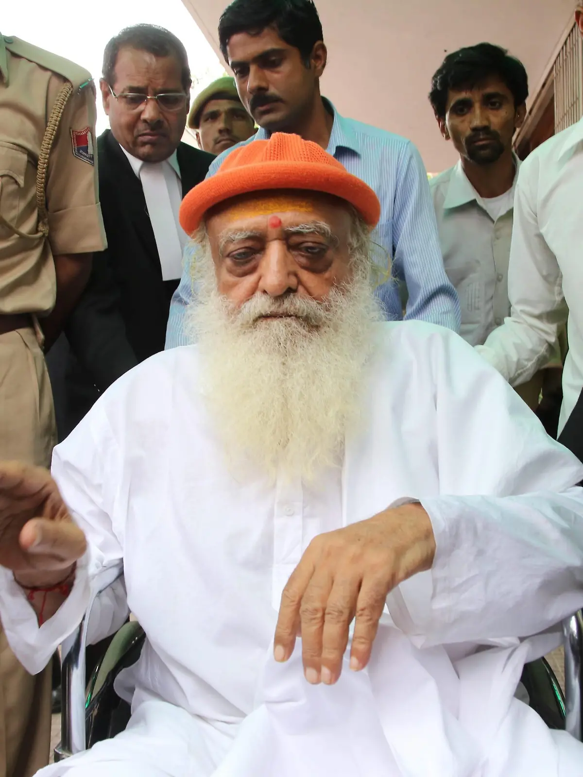 Spiritual leader Asaram Bapu accused in a sexual assault case arrives on wheel chair at the district session court for hearing. (Photo by Sunil Verma / Pacific Press)