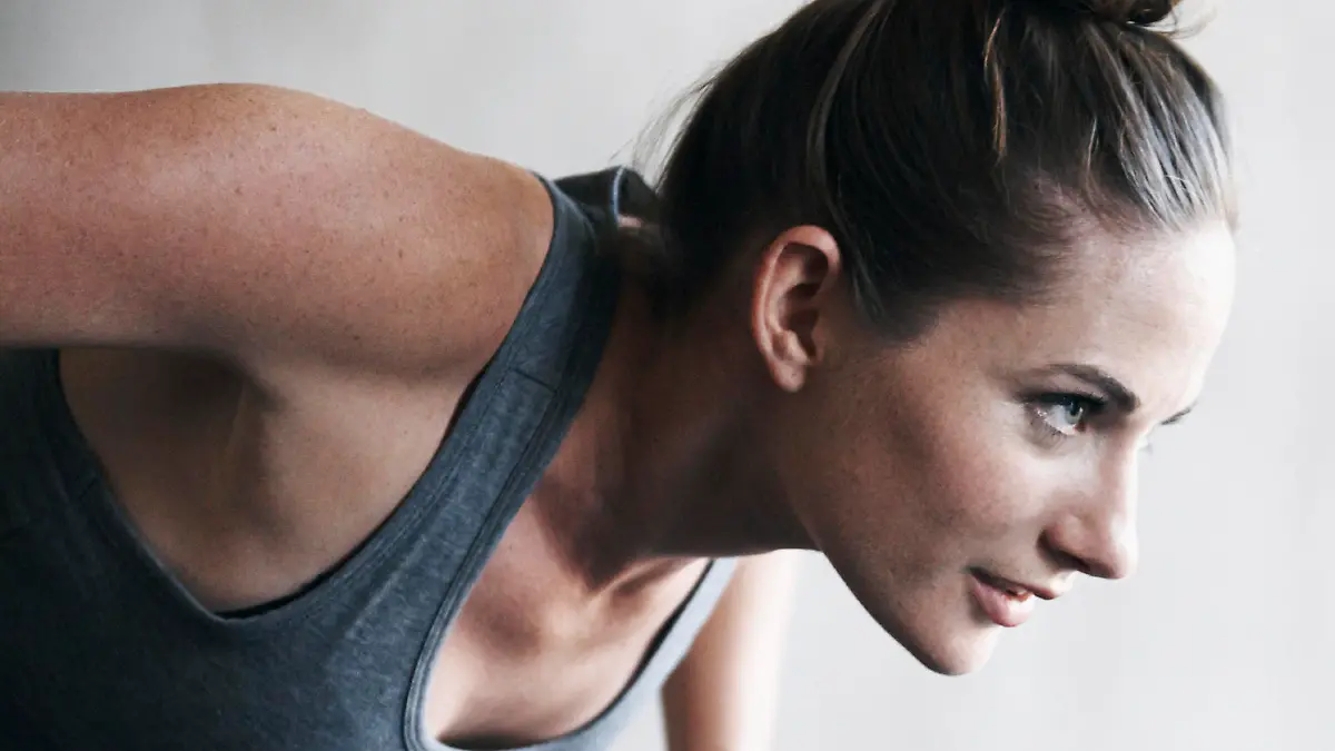 Shot of an attractive young woman working out at the gym